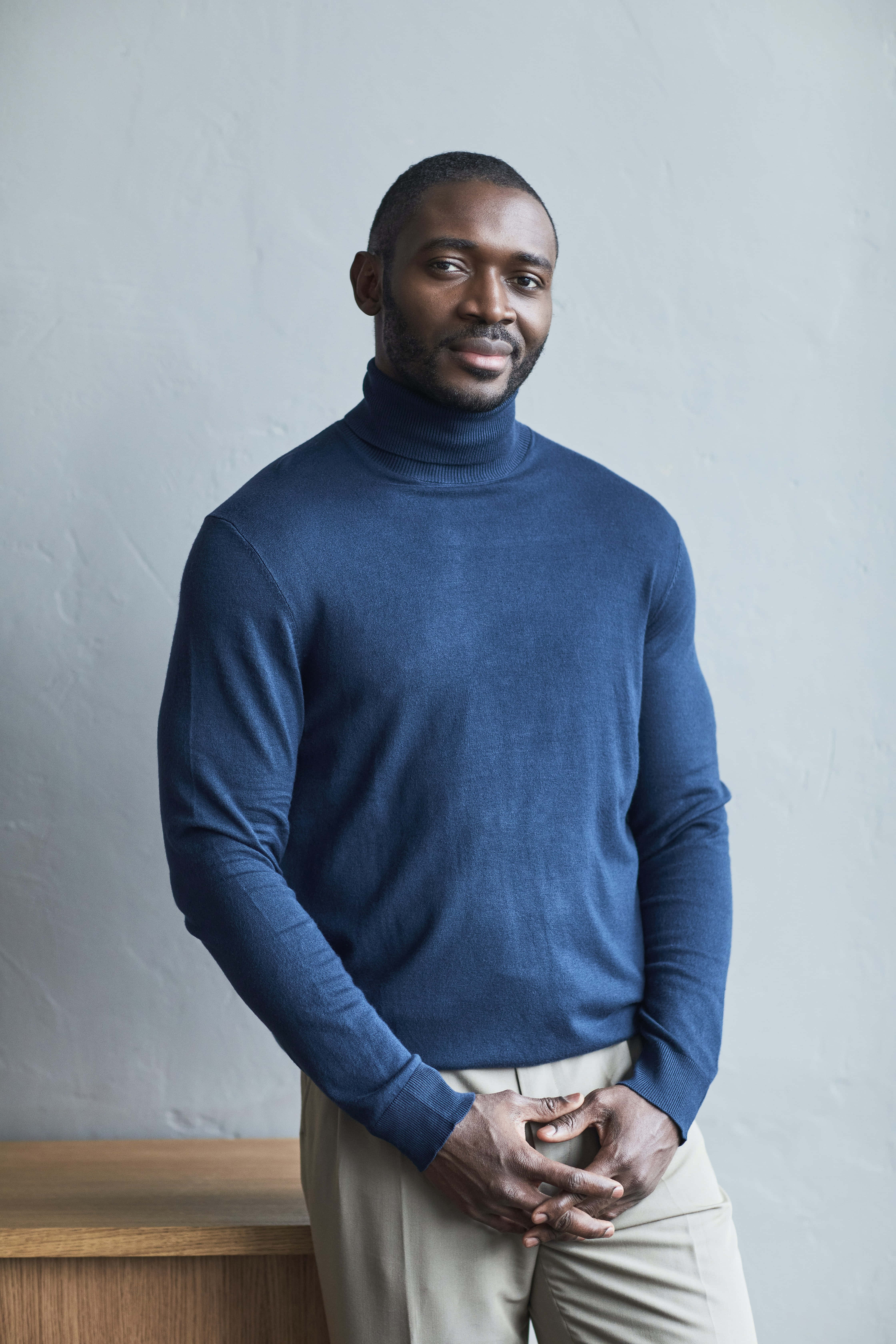 navy blue sweater, navy turtleneck, beige pants, 5K Phone Wallpaper