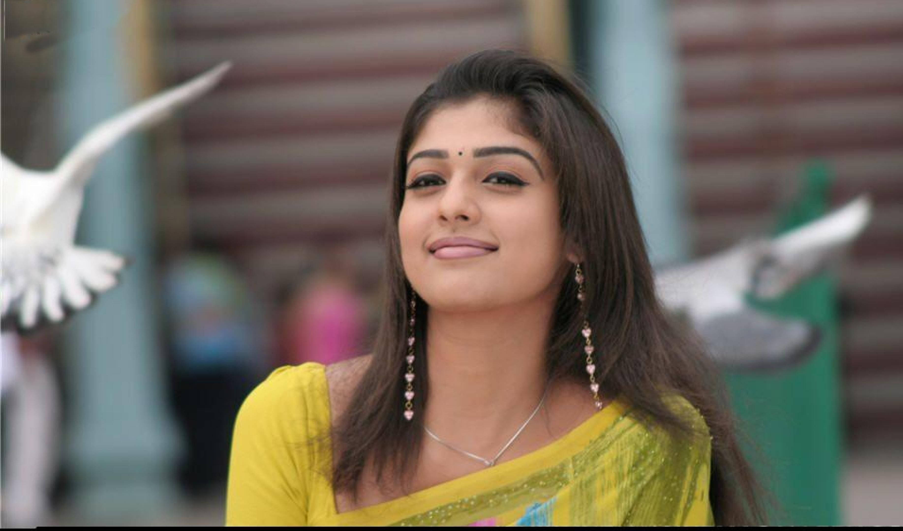 Nayanthara, yellow saree, white doves, 2K Desktop Wallpaper