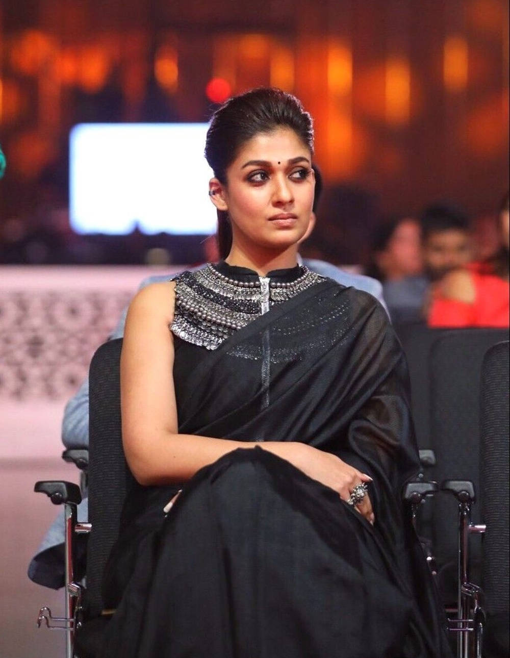 Nayanthara, black embellished sari, warmly lit event, HD Phone Wallpaper