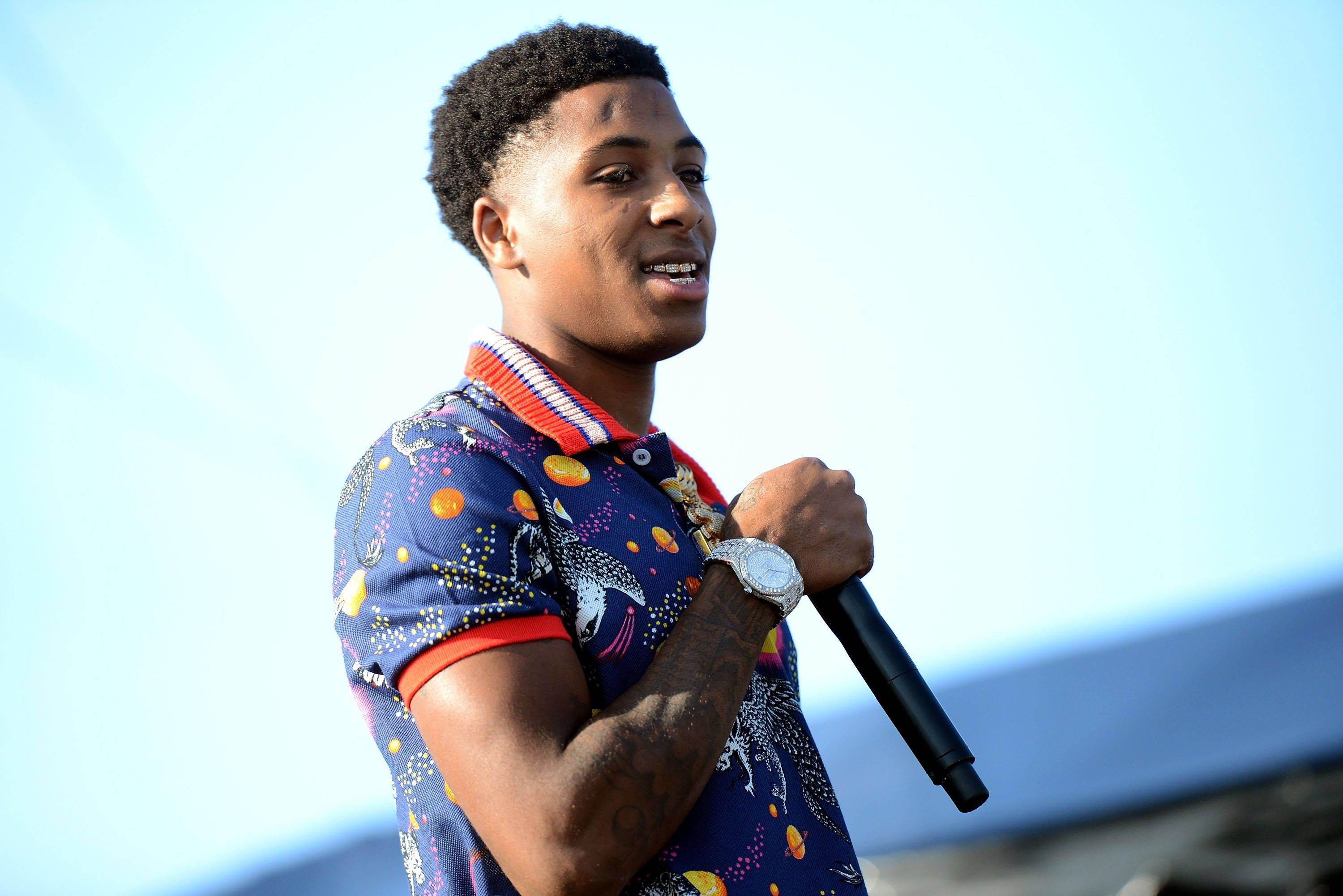 NBA Youngboy, microphone, bright blue sky, 2K Desktop Wallpaper