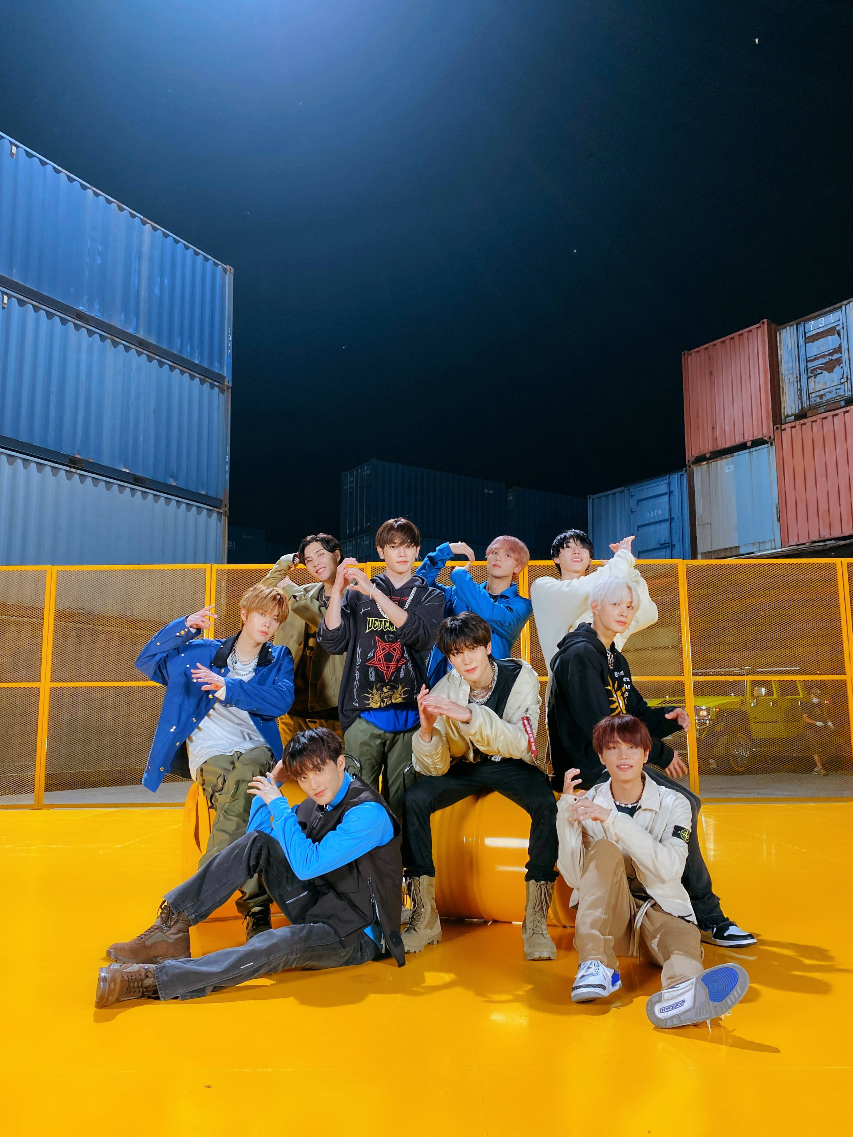 NCT 127, lemonade pose, bright yellow floor, 2K Phone Wallpaper