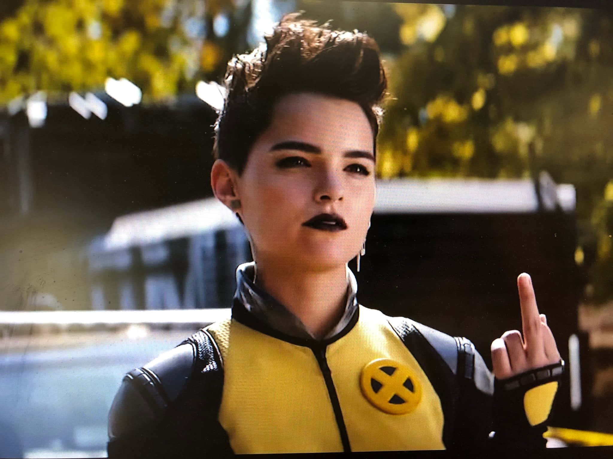 Negasonic Teenage Warhead, yellow and black X-Men costume, middle finger gesture, Full HD Desktop Wallpaper
