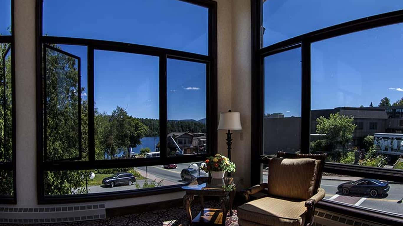 Placid Urban Area, armchair, curved windows, HD Desktop Wallpaper