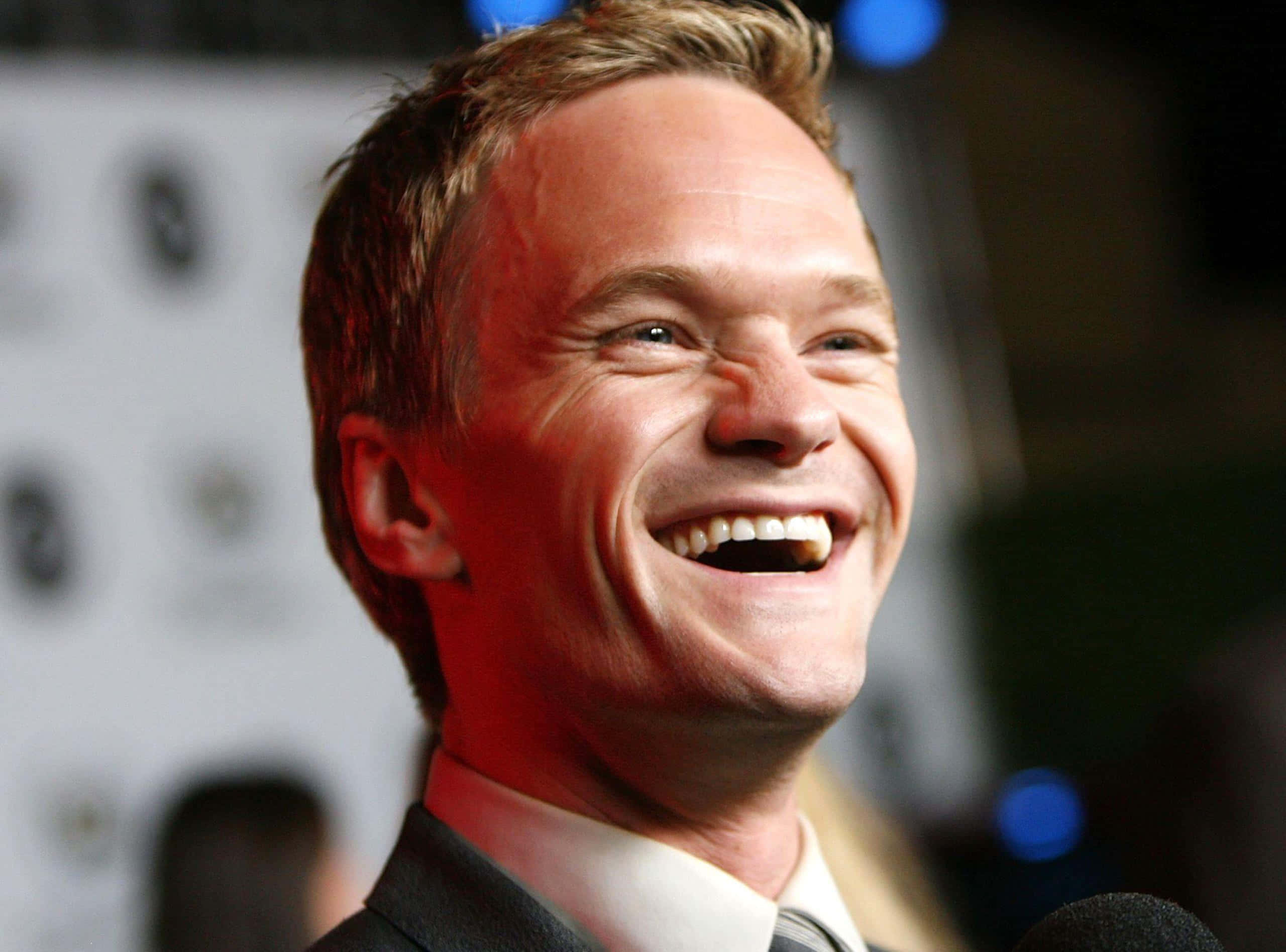 Neil Patrick Harris, close-up shot, laughing broadly, 2K Desktop Wallpaper