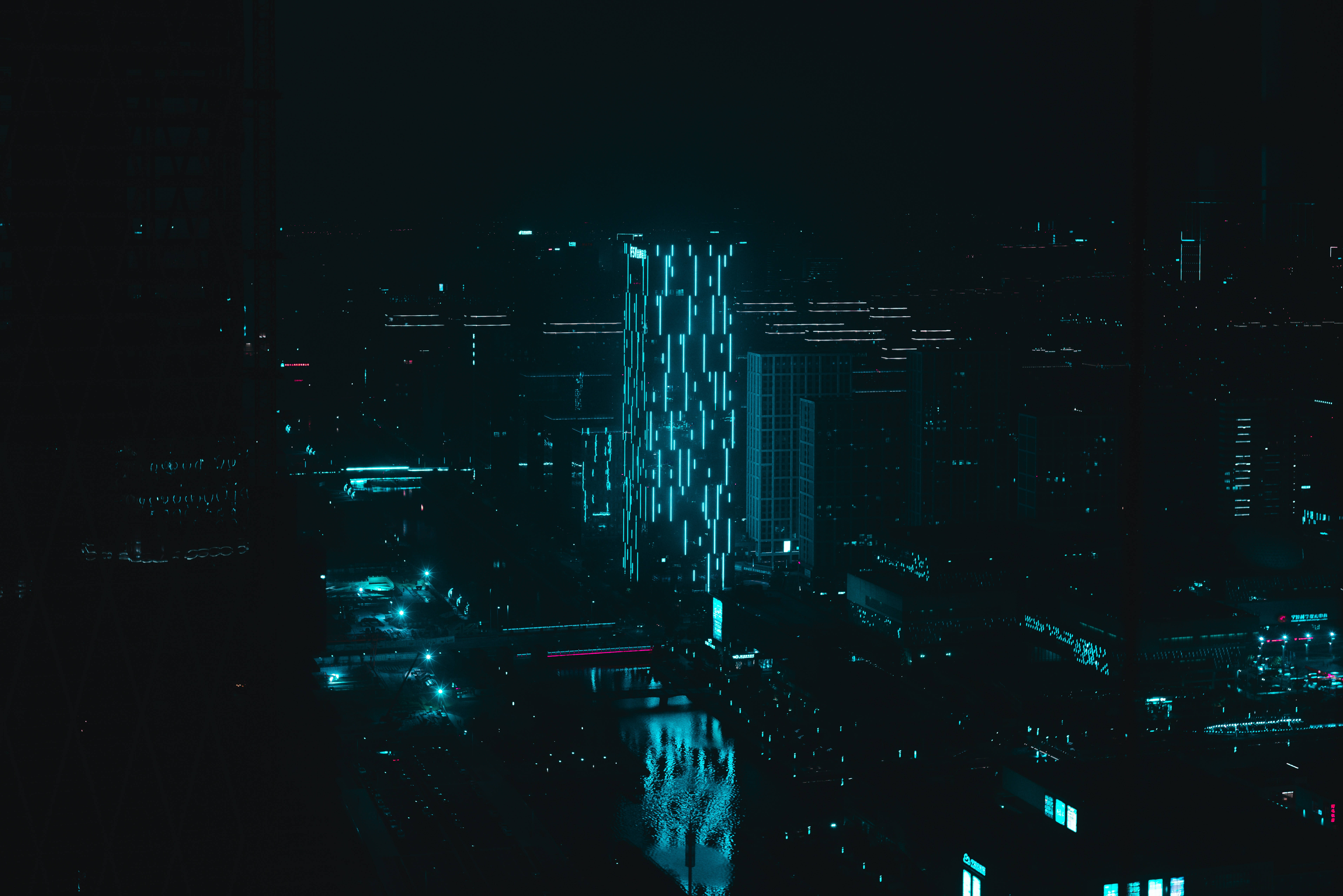 Neon City, towering skyscraper, vertical blue light patterns, 5K Desktop Wallpaper