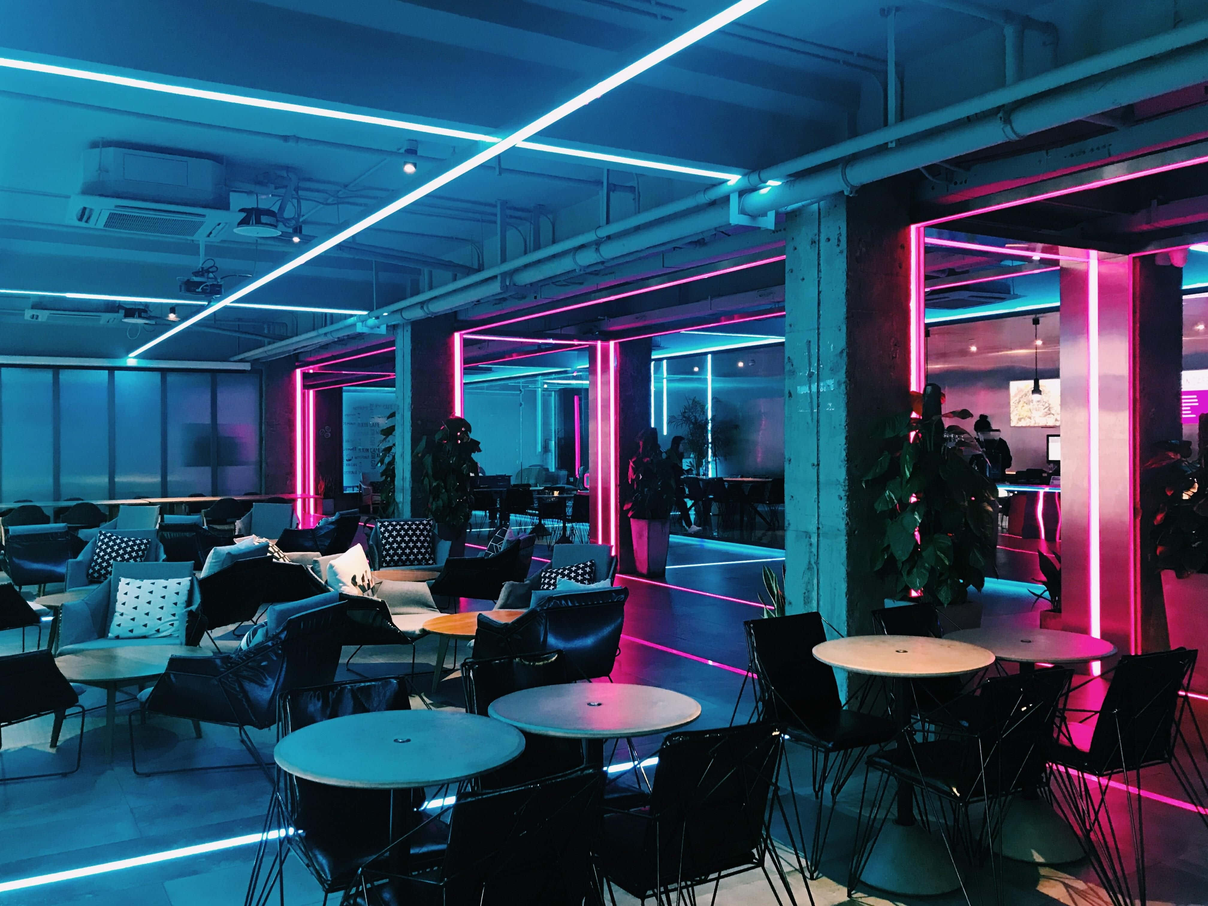 Neon Lit Cyberpunk Lounge, vibrant blue neon lights, pink neon lights, 4K Desktop Wallpaper