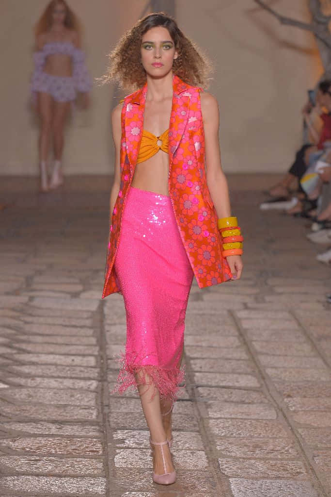 vibrant pink sequined skirt, floral orange vest, bold accessories, SD Phone Wallpaper
