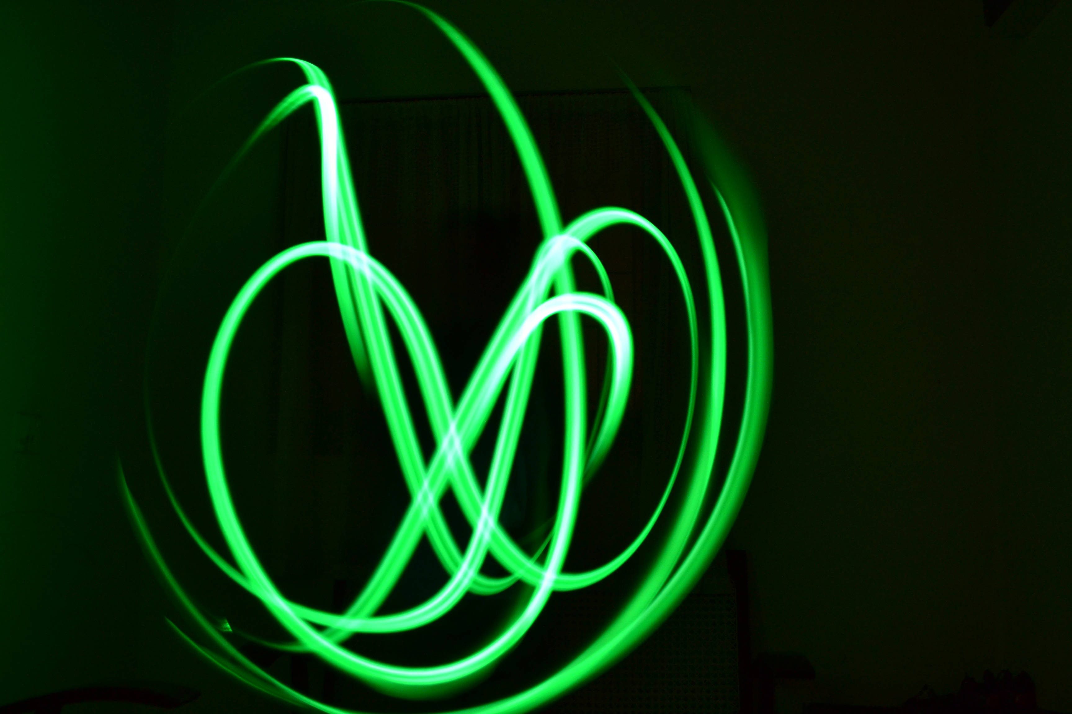 Neon Green, glow in the dark, vibrant green light trails, 2K Desktop Wallpaper