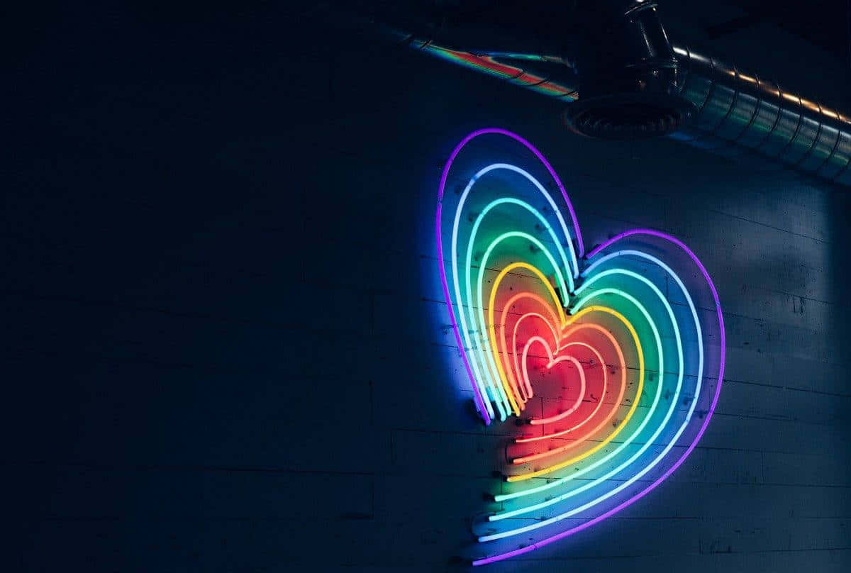 rainbow neon heart, dark brick wall, dimly lit industrial space, SD Desktop Wallpaper