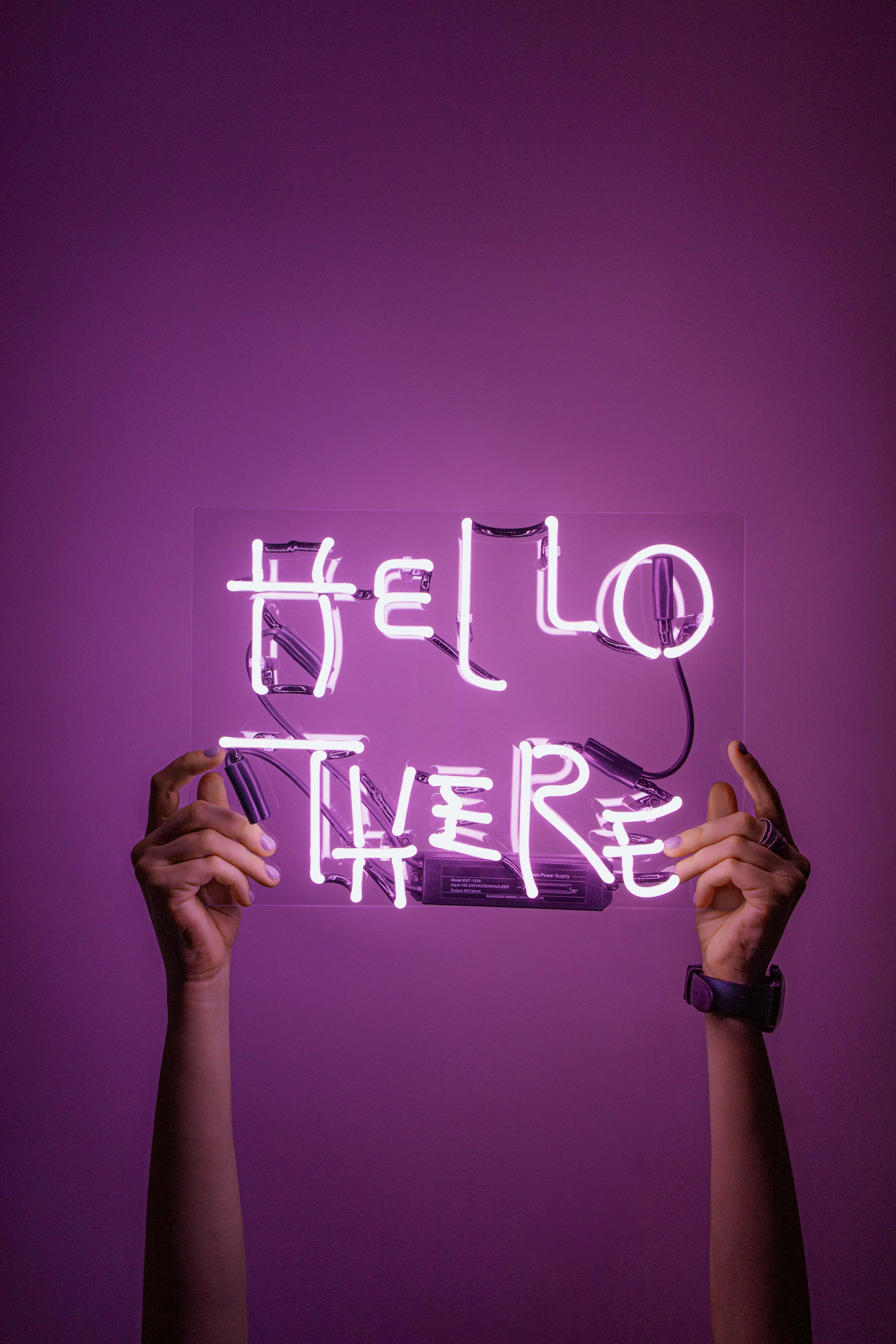 Hello There, glowing neon sign, solid purple wall, 5K Phone Wallpaper