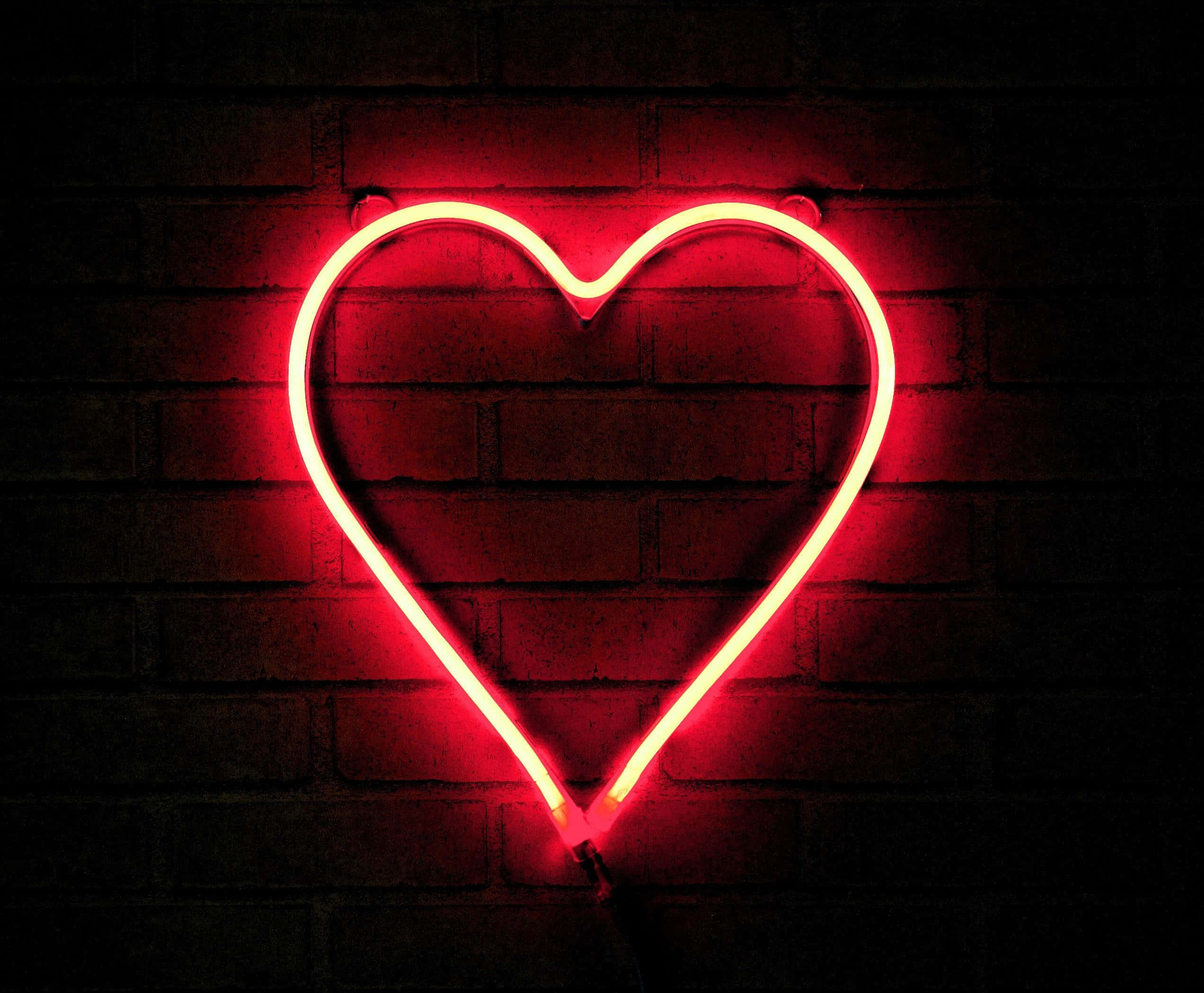 red neon heart sign, dark brick wall, dimly lit setting, Full HD Desktop Wallpaper