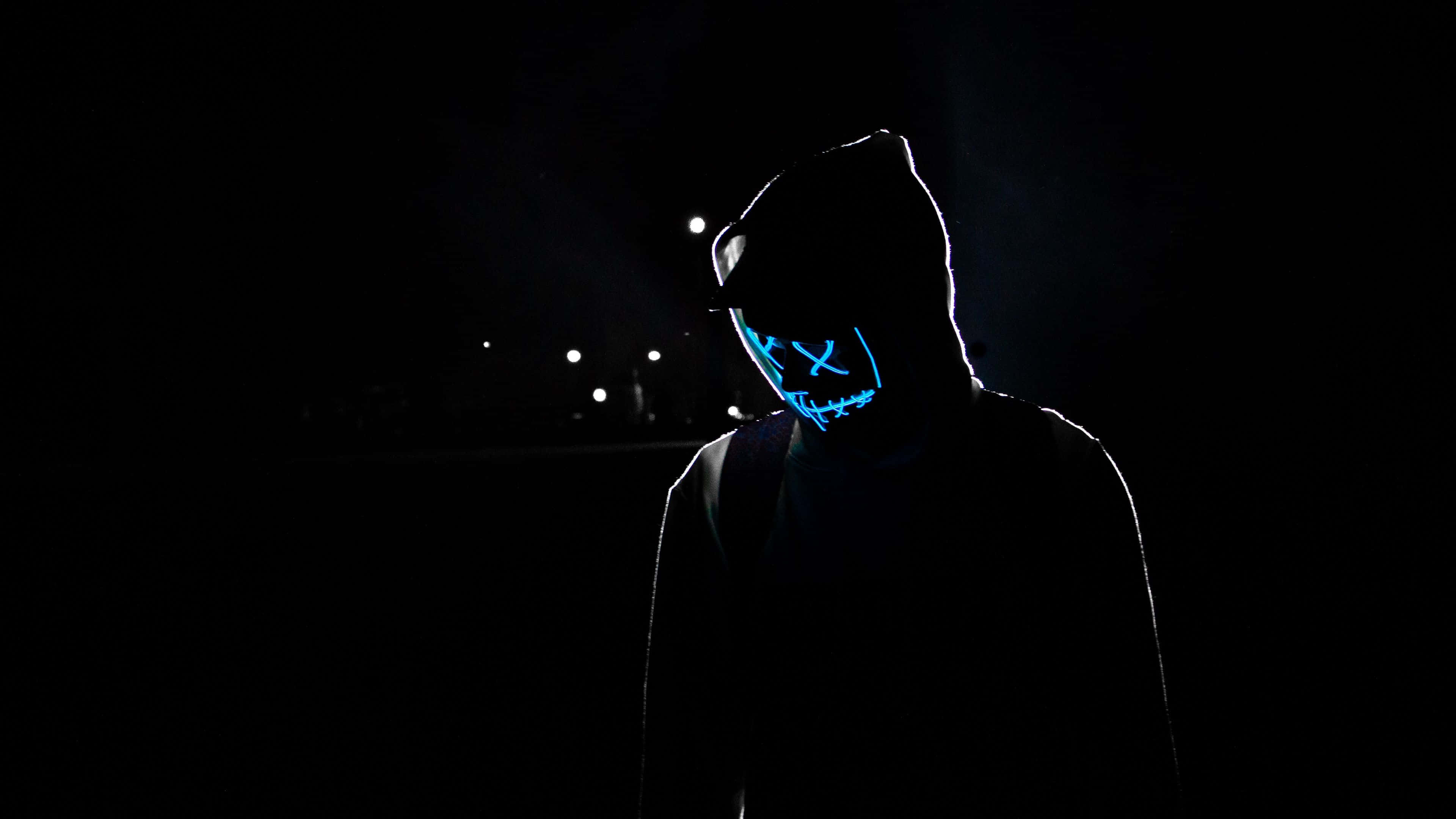 Neon Mask, glowing blue LED skull mask, hooded figure, 4K Desktop Wallpaper