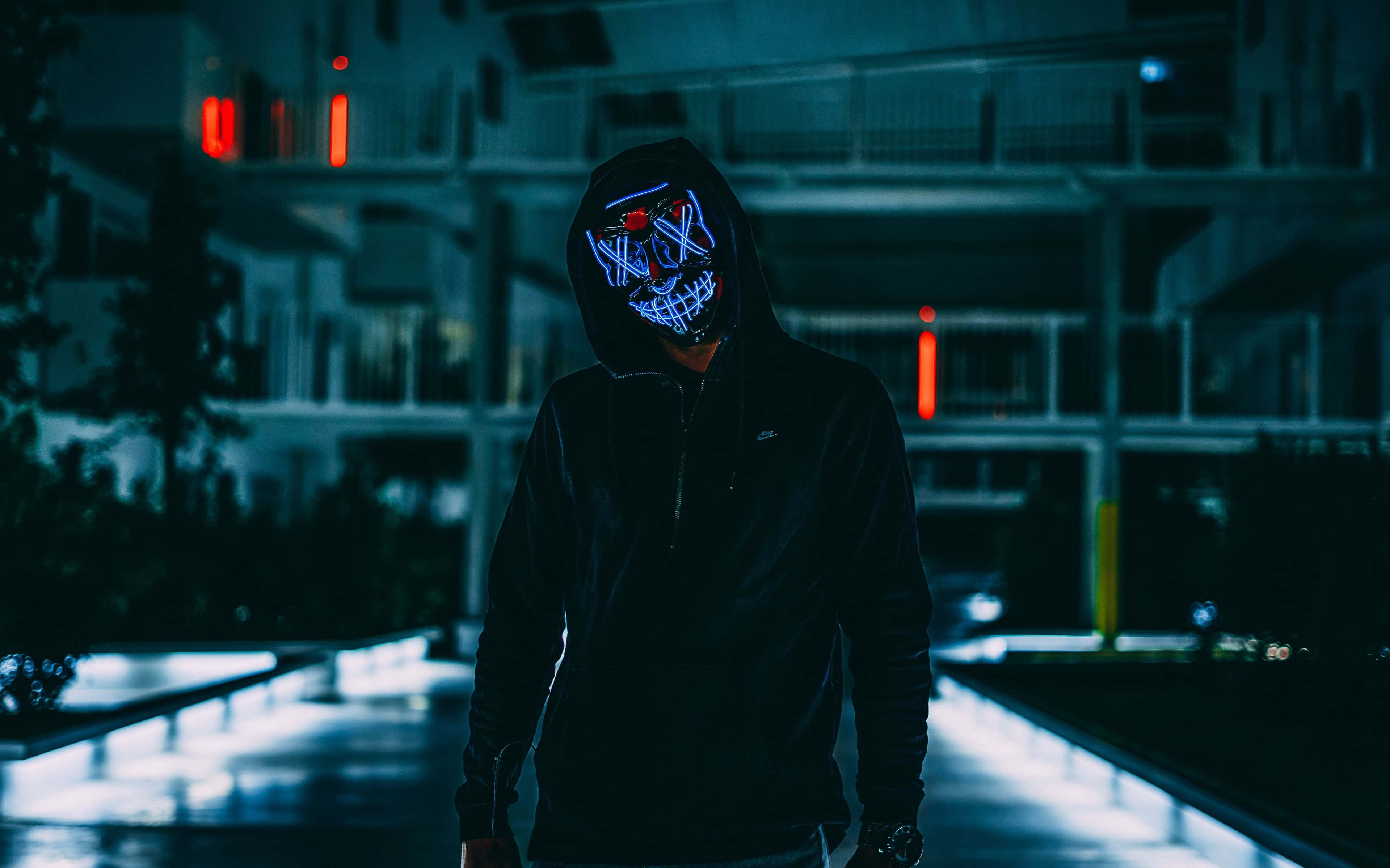 Neon Mask, glowing blue and red LED mask, dark urban alleyway, 4K Desktop Wallpaper