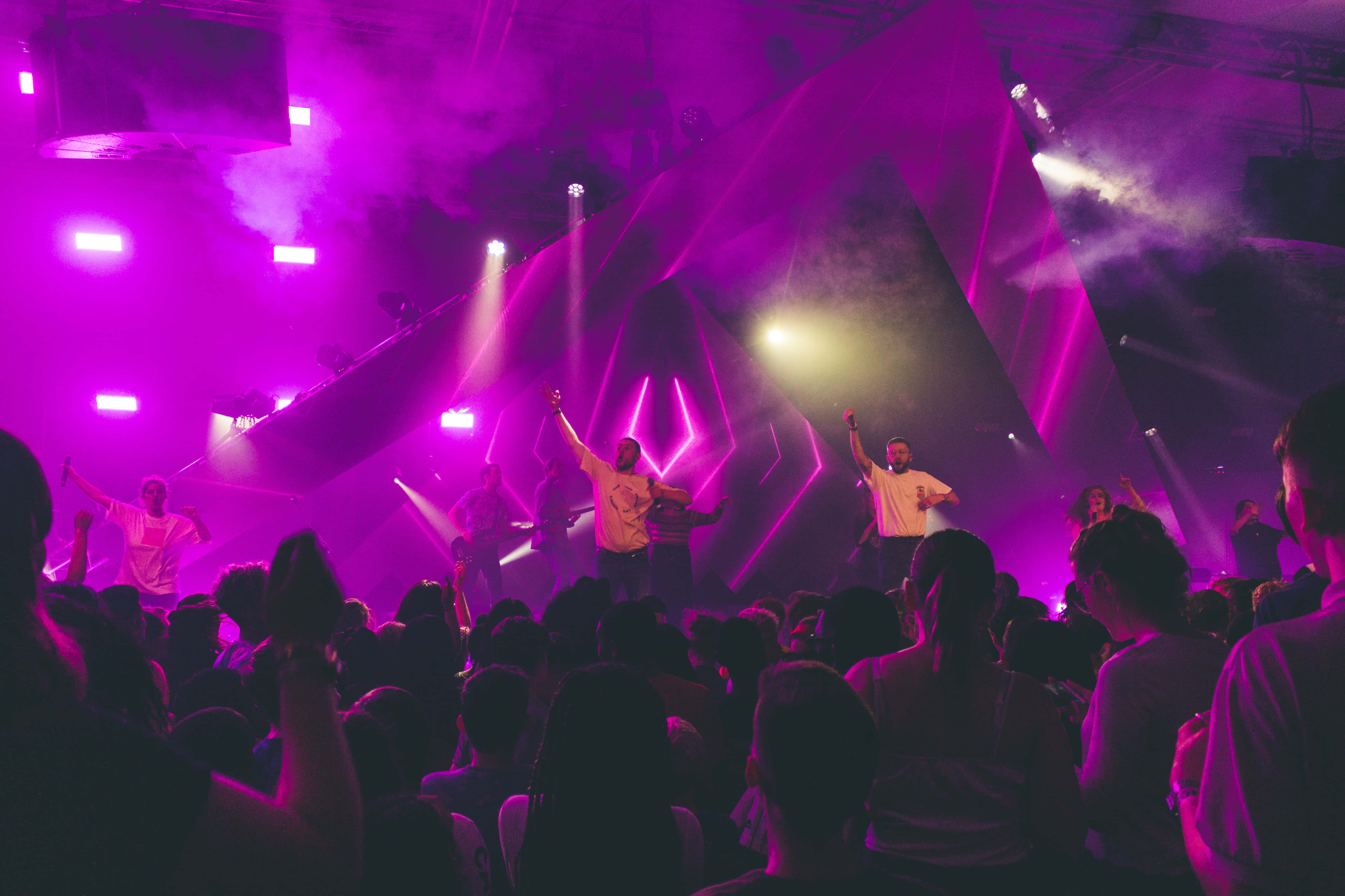 Neon Music, vibrant purple lights, geometric stage, 5K Desktop Wallpaper