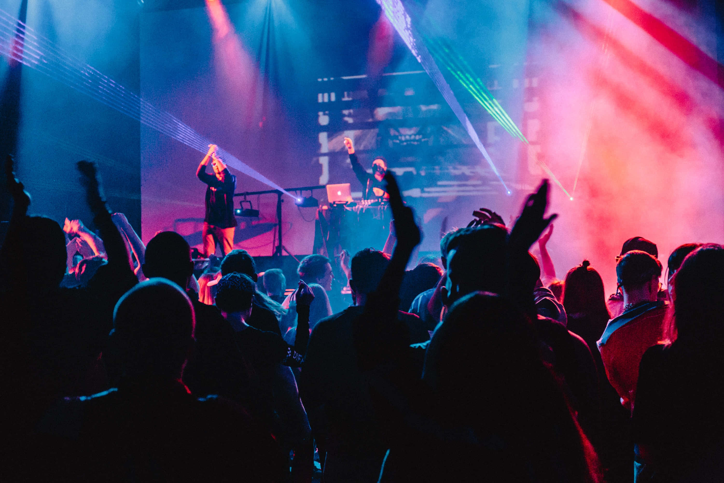 vibrant blue, pink stage lights, laser beams, 2K Desktop Wallpaper