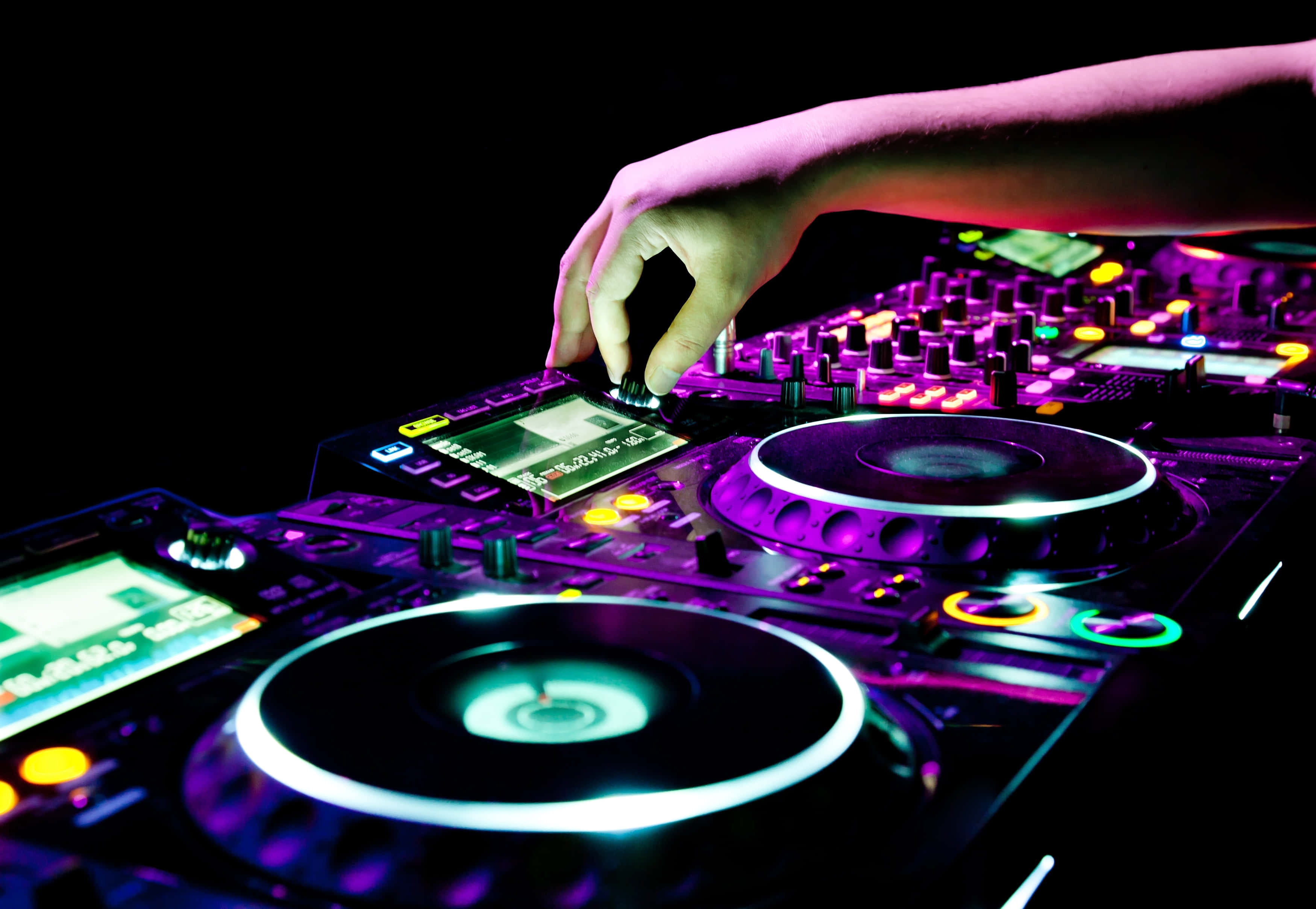 glowing purple and green DJ controller, strobe lights, neon glow, 2K Desktop Wallpaper