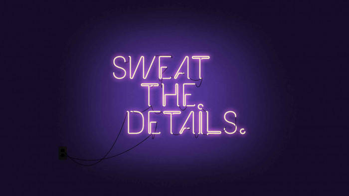 glowing purple neon sign, dark wall, visible wires, SD Desktop Wallpaper