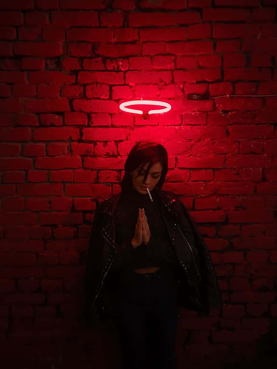 black jacket, red brick wall, glowing red neon halo, SD Phone Wallpaper