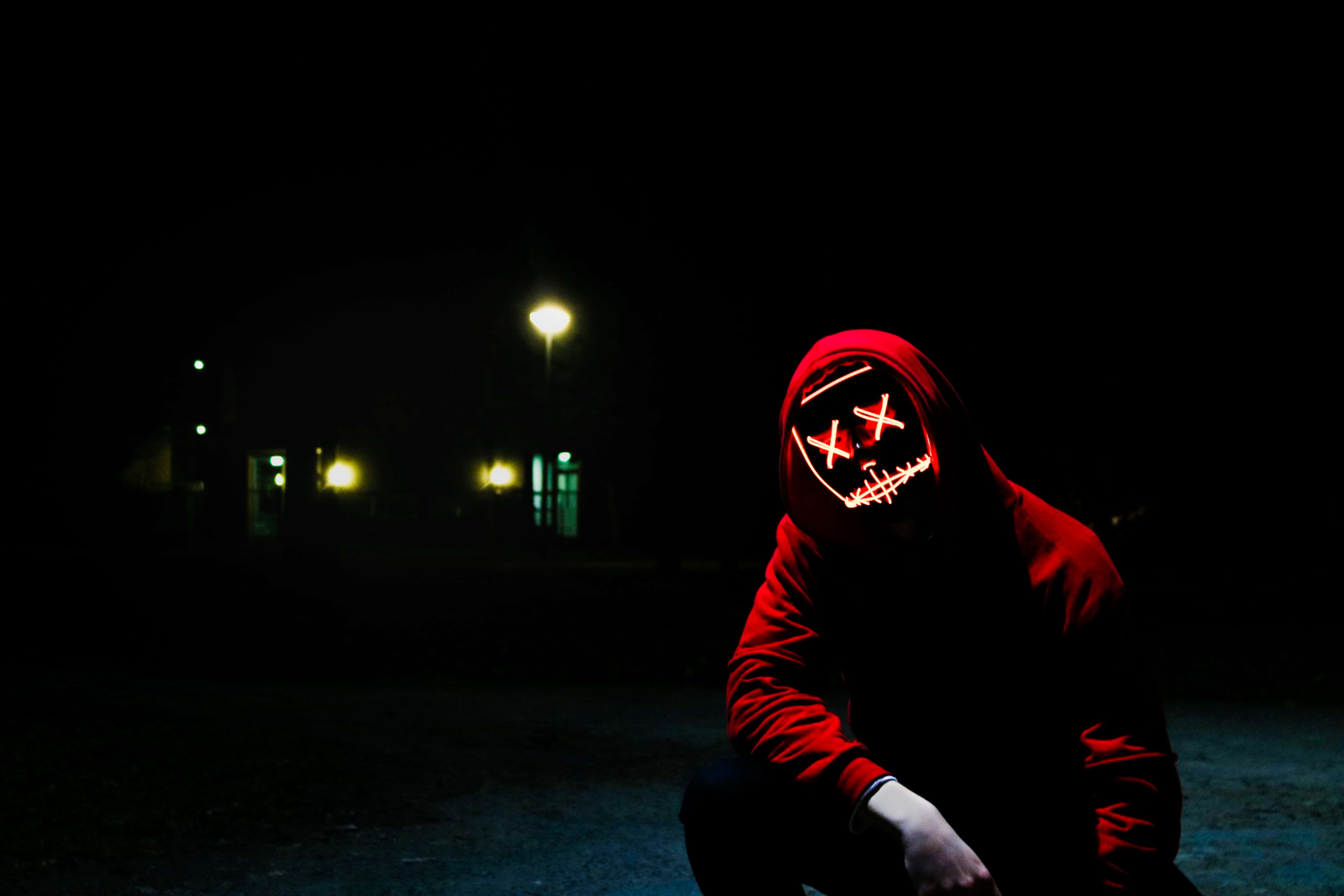 red hoodie, glowing red LED mask, X eyes, 5K Desktop Wallpaper