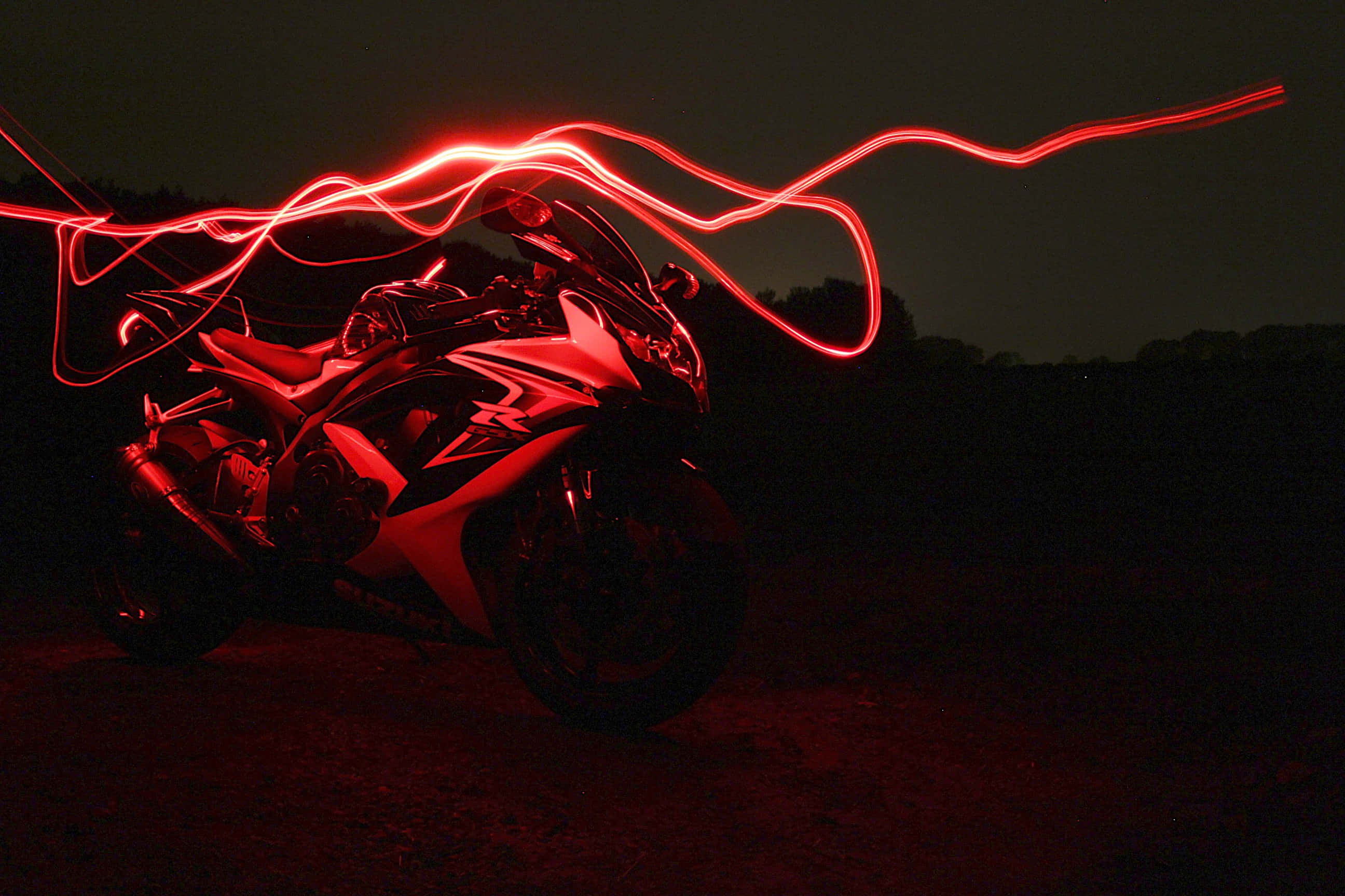 Neon Red, red light trails, long-exposure night shot, 2K Desktop Wallpaper