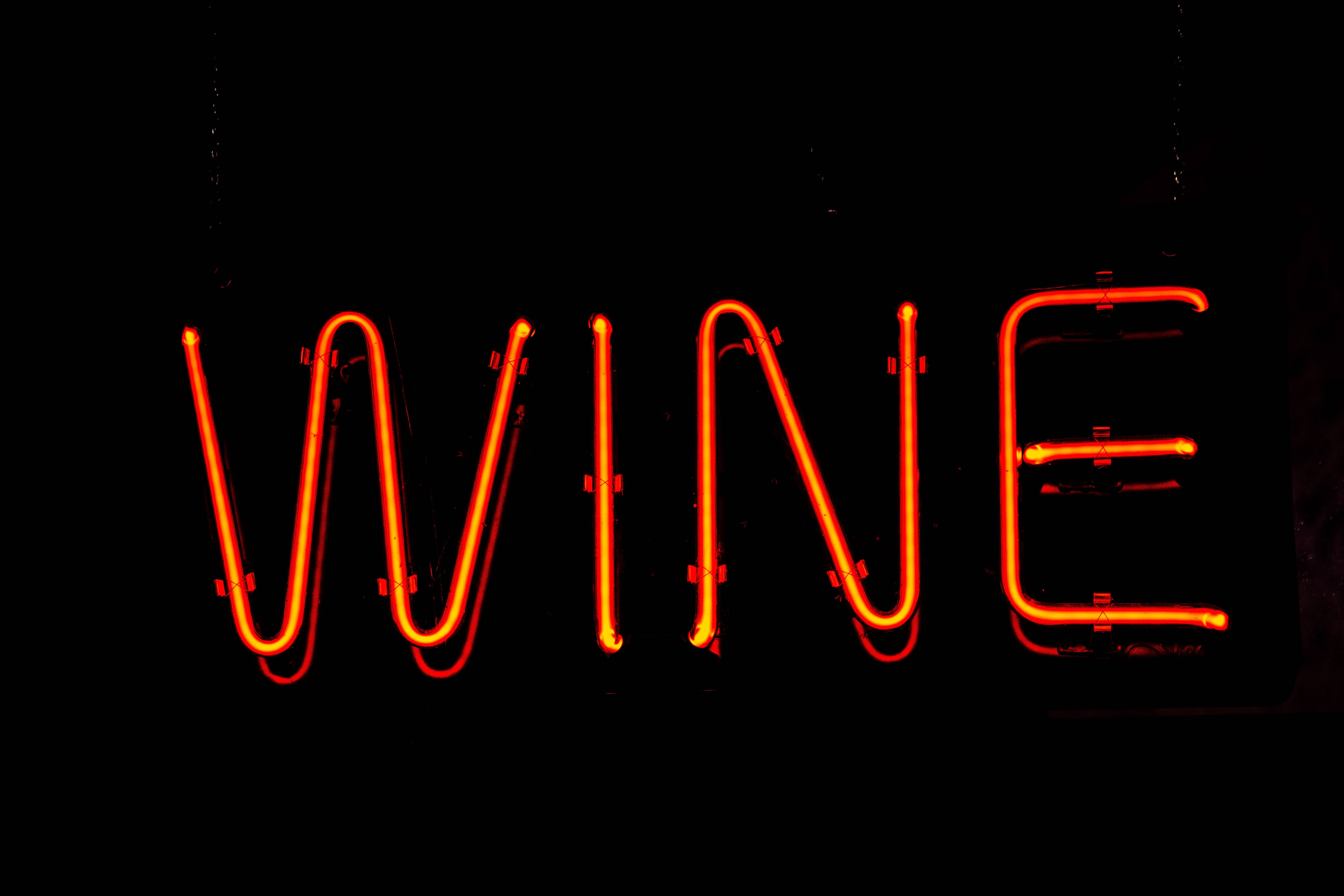 WINE, orange neon sign, pitch black background, 5K Desktop Wallpaper