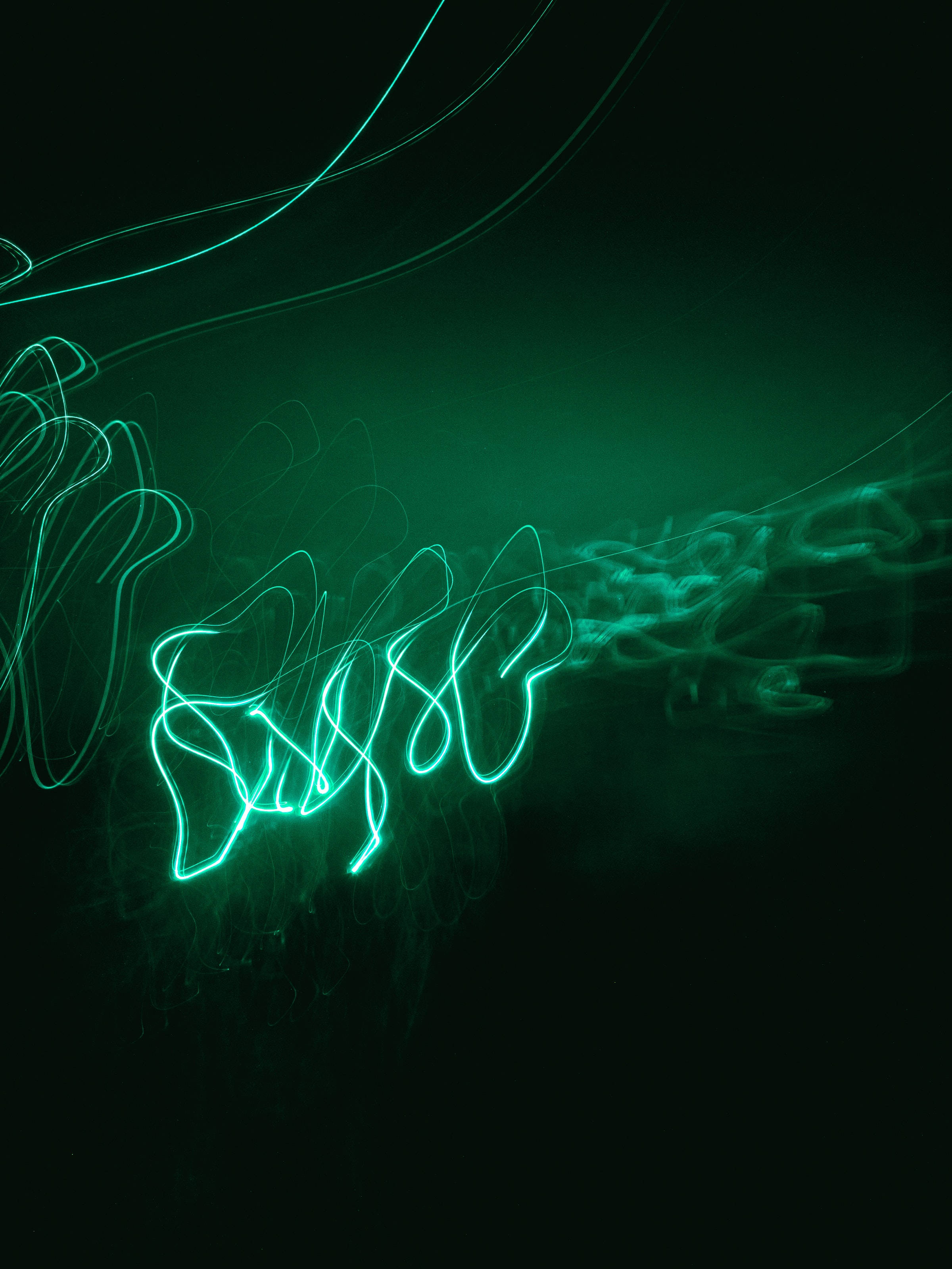 green neon lights, teal light trails, deep black background, 2K Phone Wallpaper