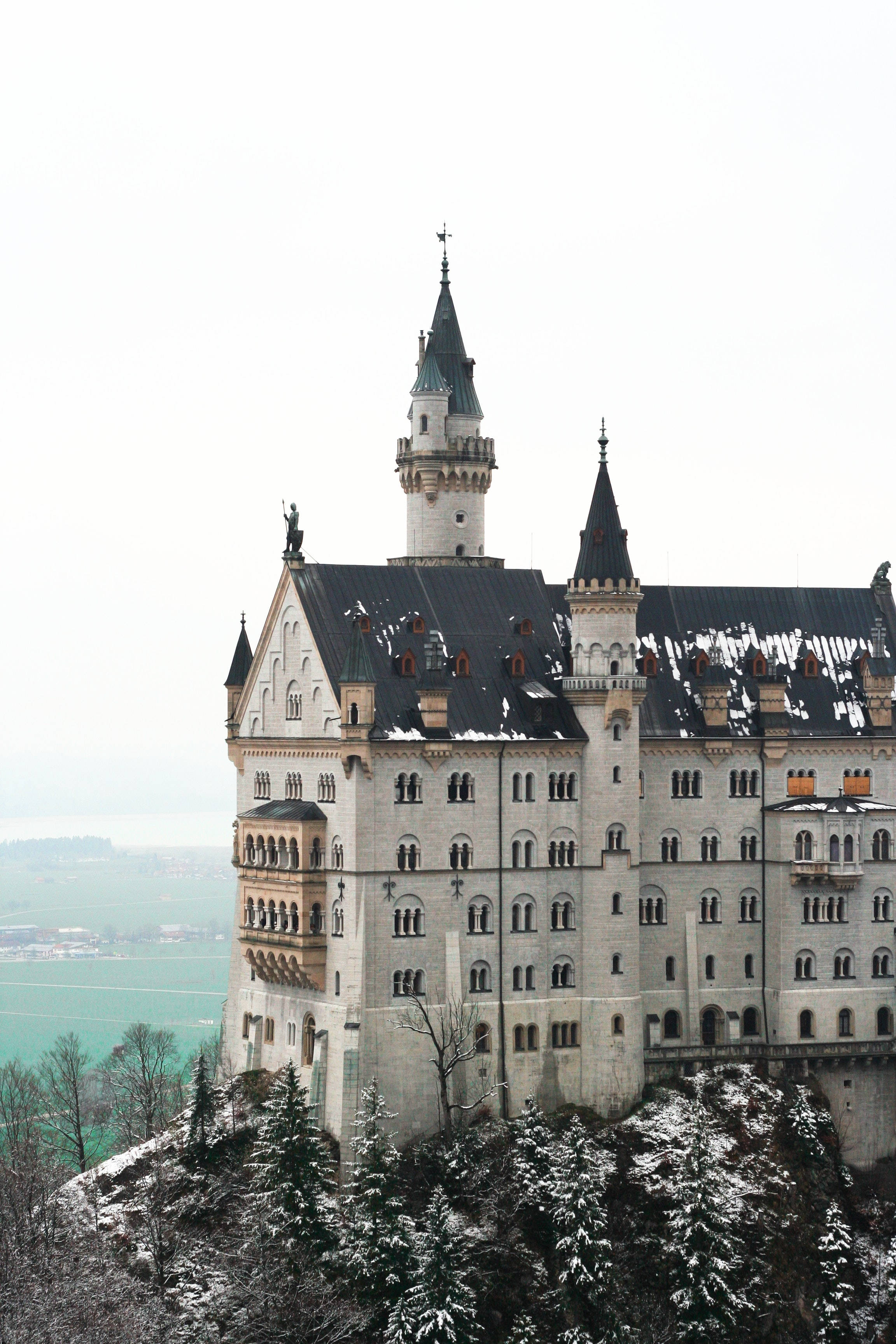Neuschwanstein Castle, snow on roof, hilltop, 2K Phone Wallpaper