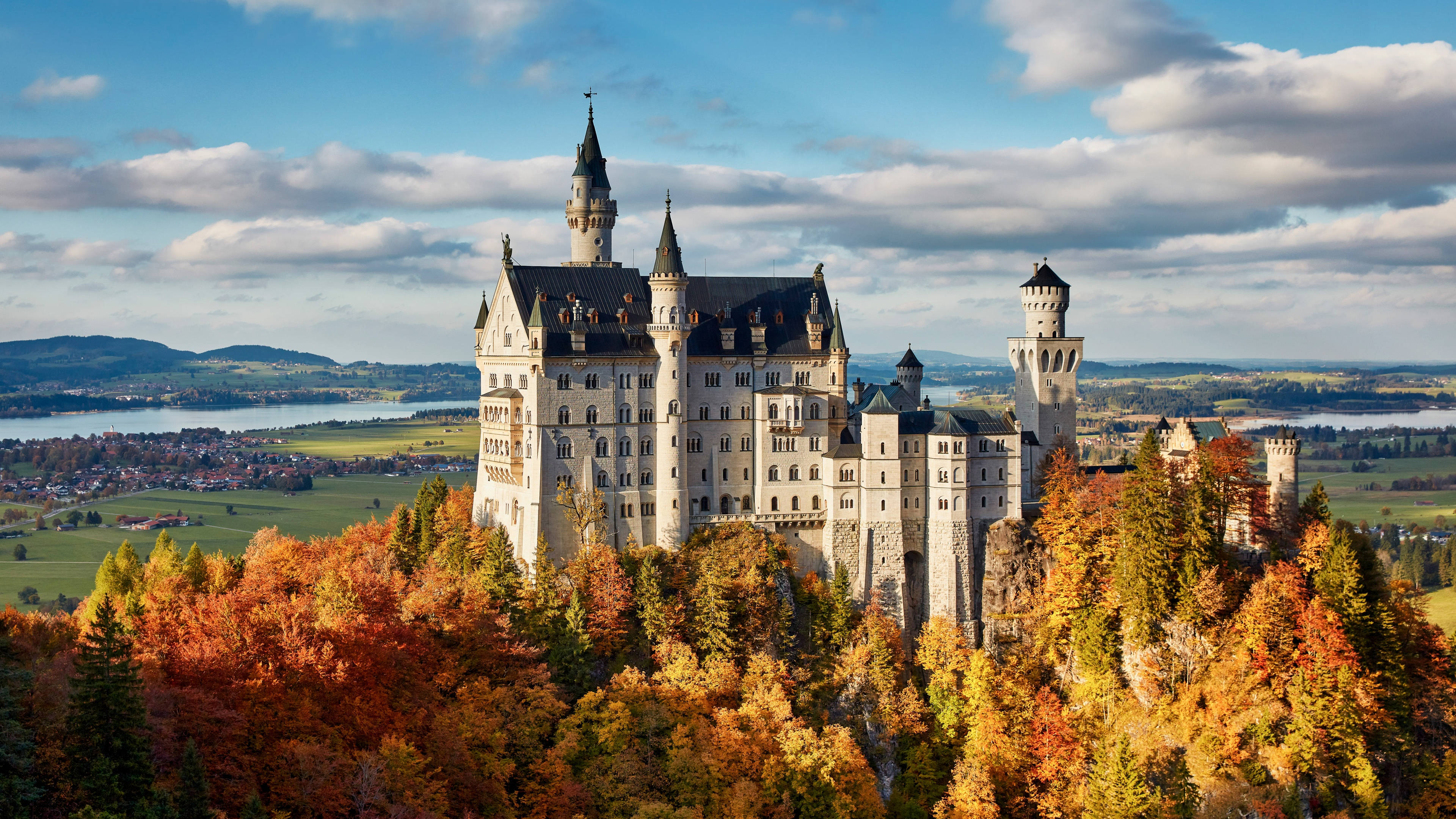 Neuschwanstein Castle, orange trees, autumn foliage, 4K Desktop Wallpaper
