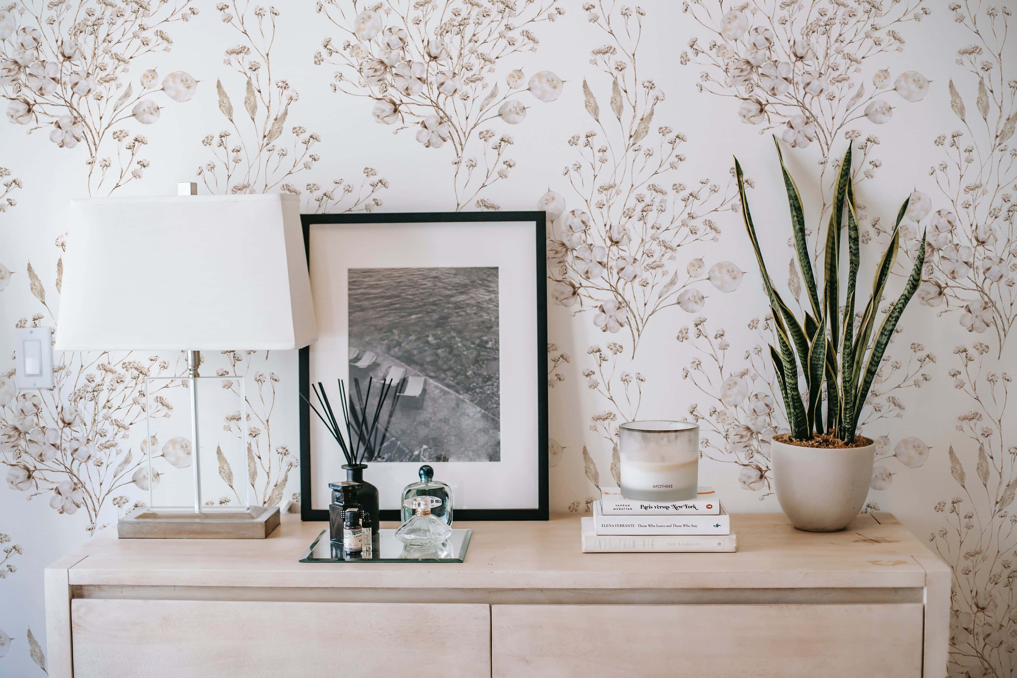 floral wallpaper, serene bedroom console, potted snake plant, 2K Desktop Wallpaper