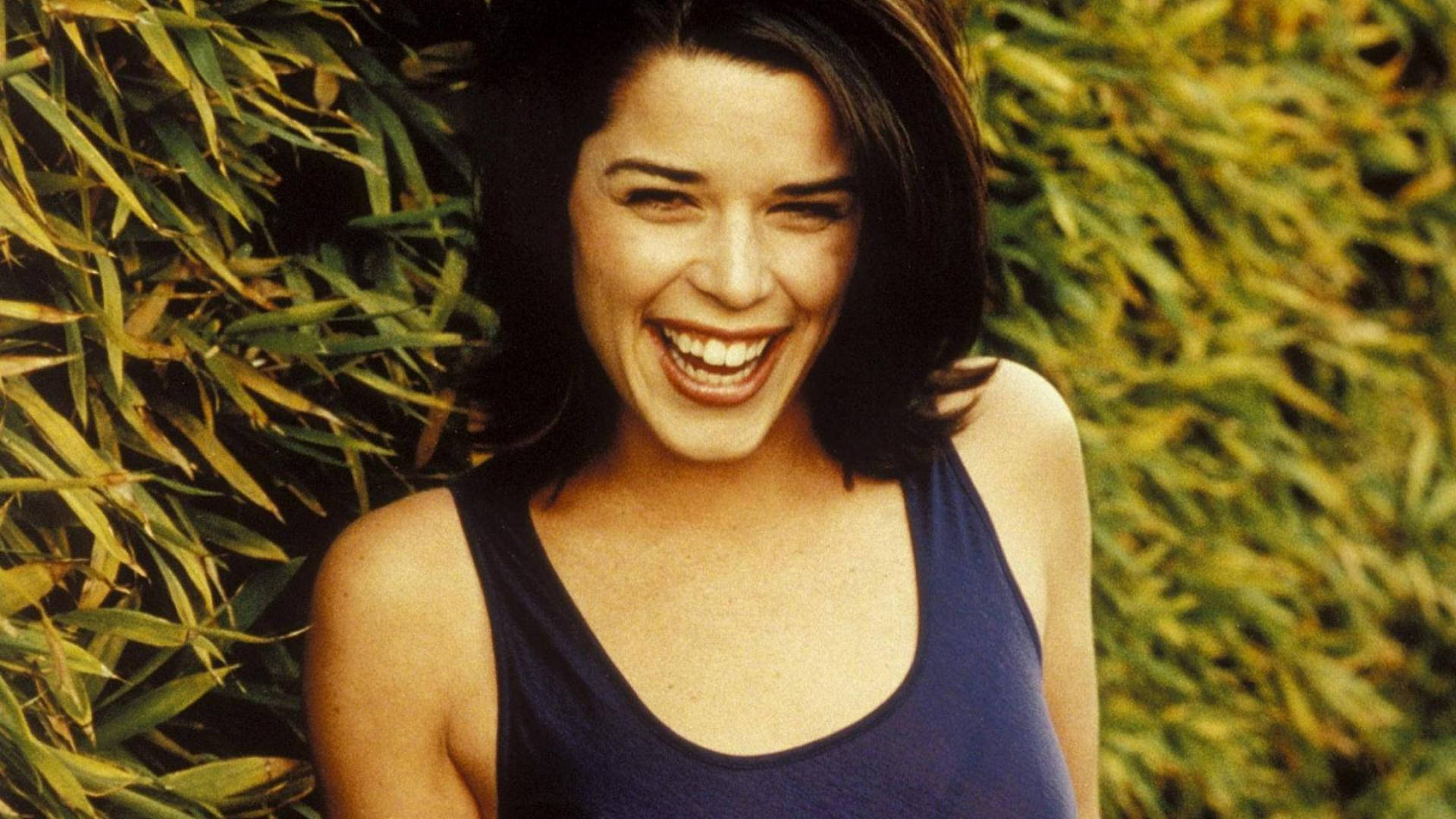 Neve Campbell, dark hair, lush green bamboo foliage, Full HD Desktop Wallpaper