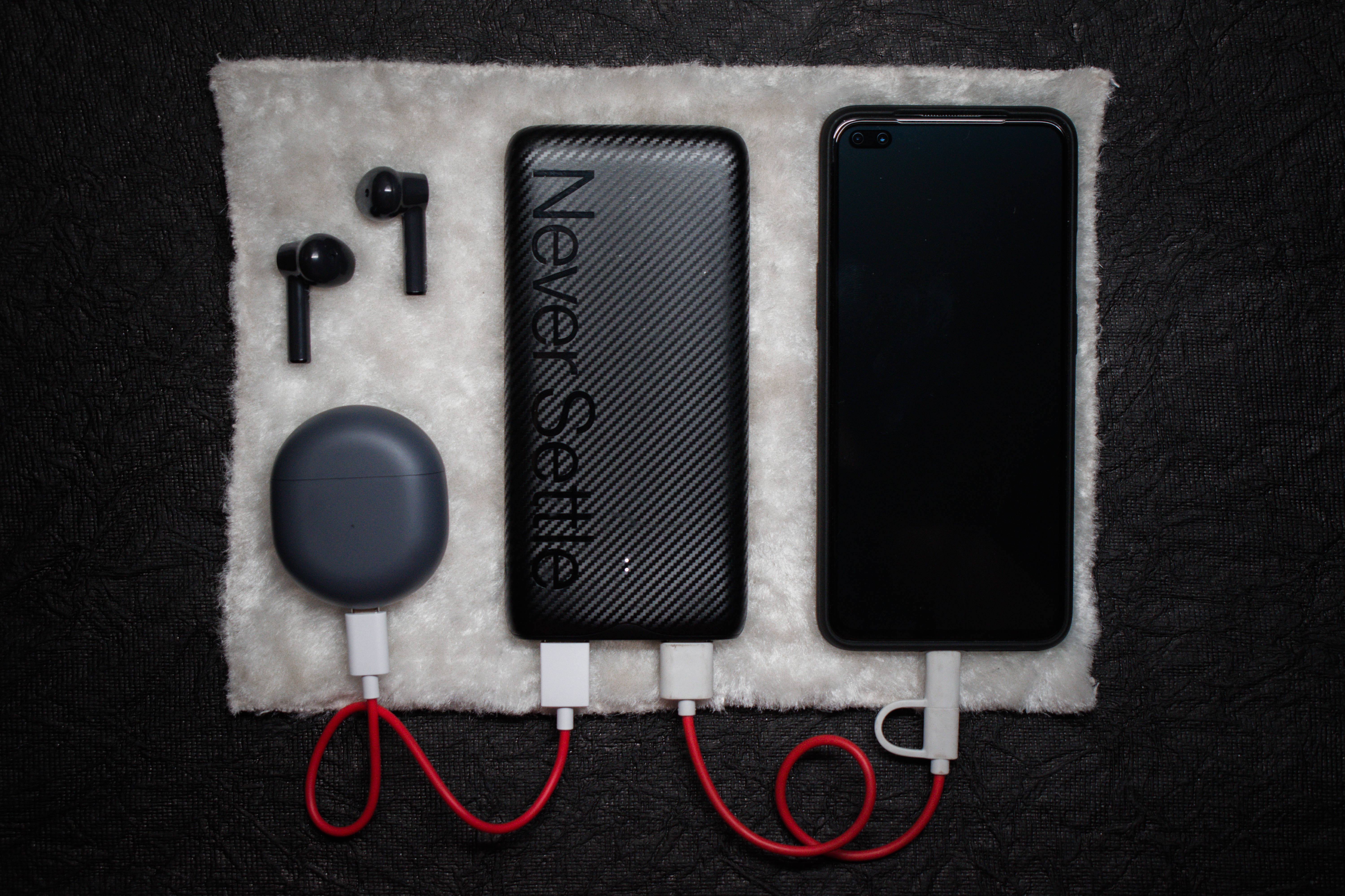 Never Settle, black smartphone power bank, earbuds, 5K Desktop Wallpaper