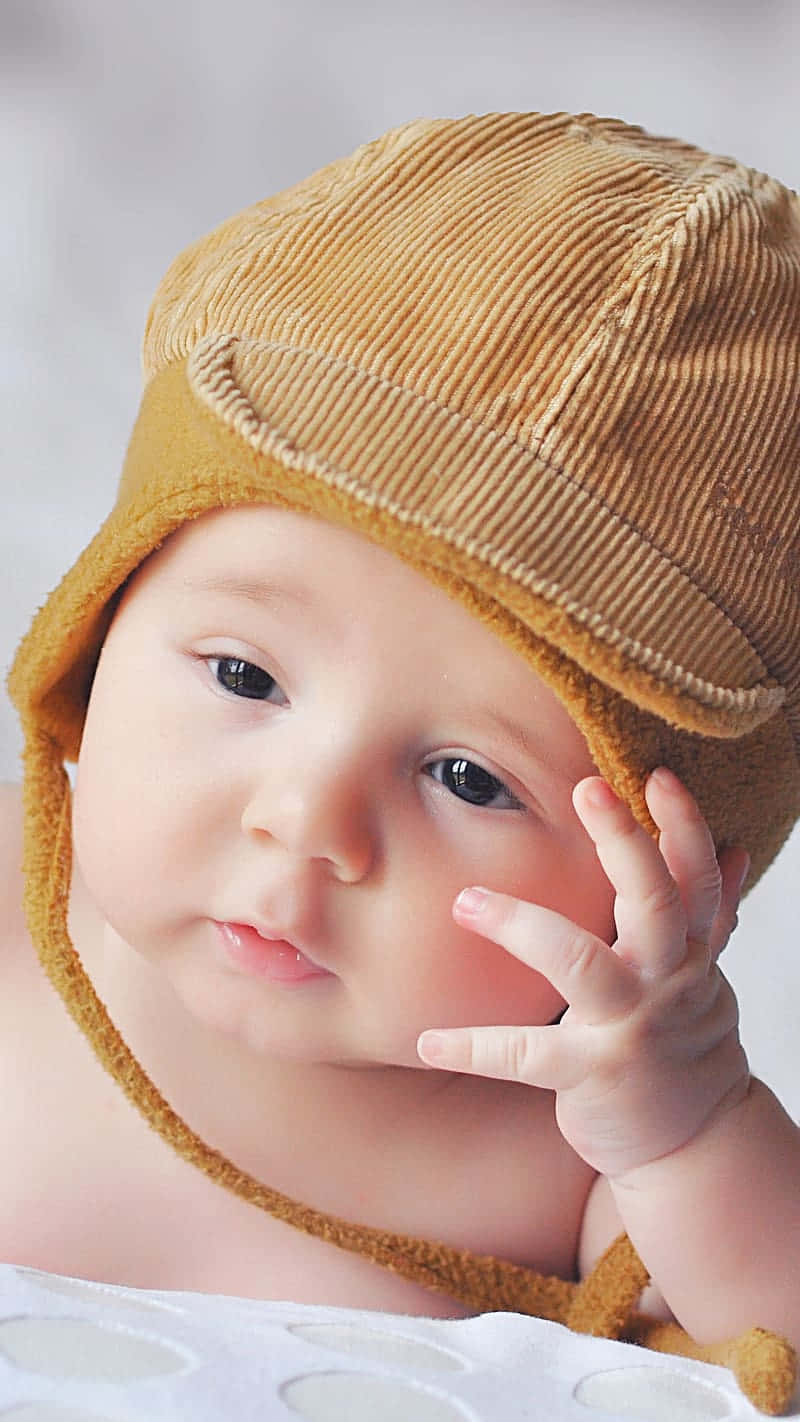 mustard corduroy hat, ear flaps, white textured blanket, HD Phone Wallpaper