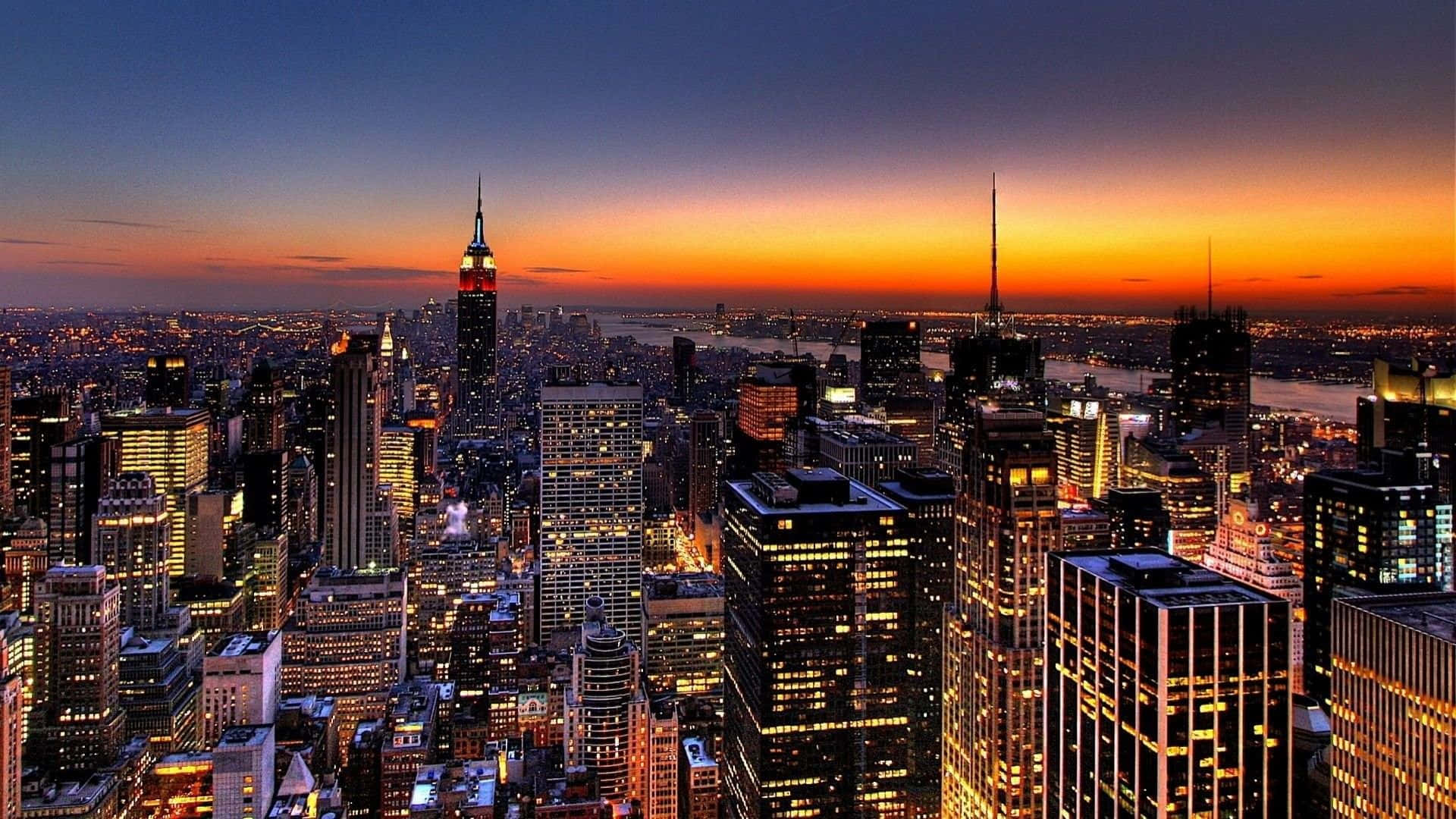 New York City skyline, golden orange horizon, illuminated skyscrapers, Full HD Desktop Wallpaper