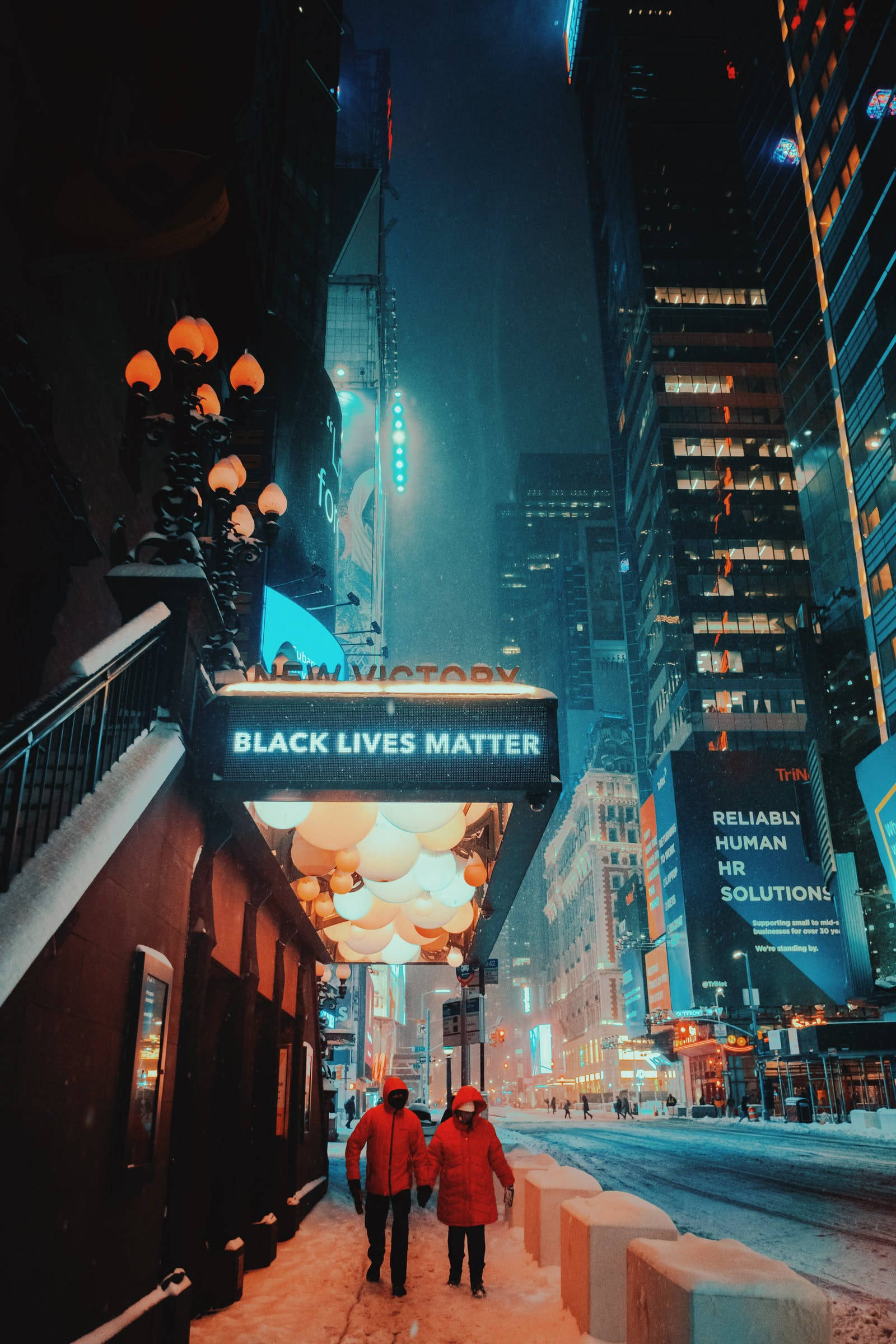 New York City Night, red coats, snowy neon-lit city street, Full HD Phone Wallpaper