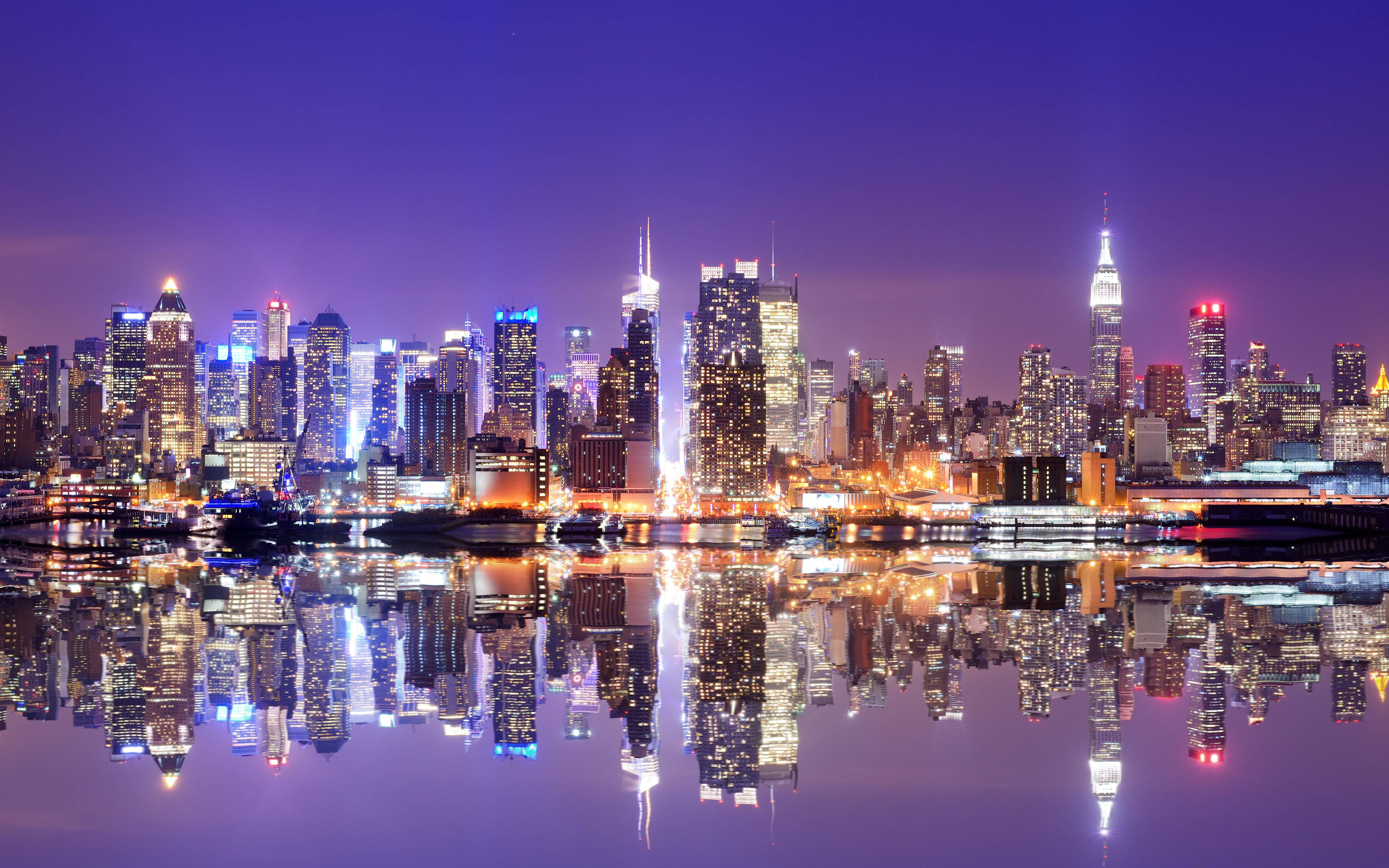 New York City, nighttime cityscape, skyscrapers, 4K Desktop Wallpaper