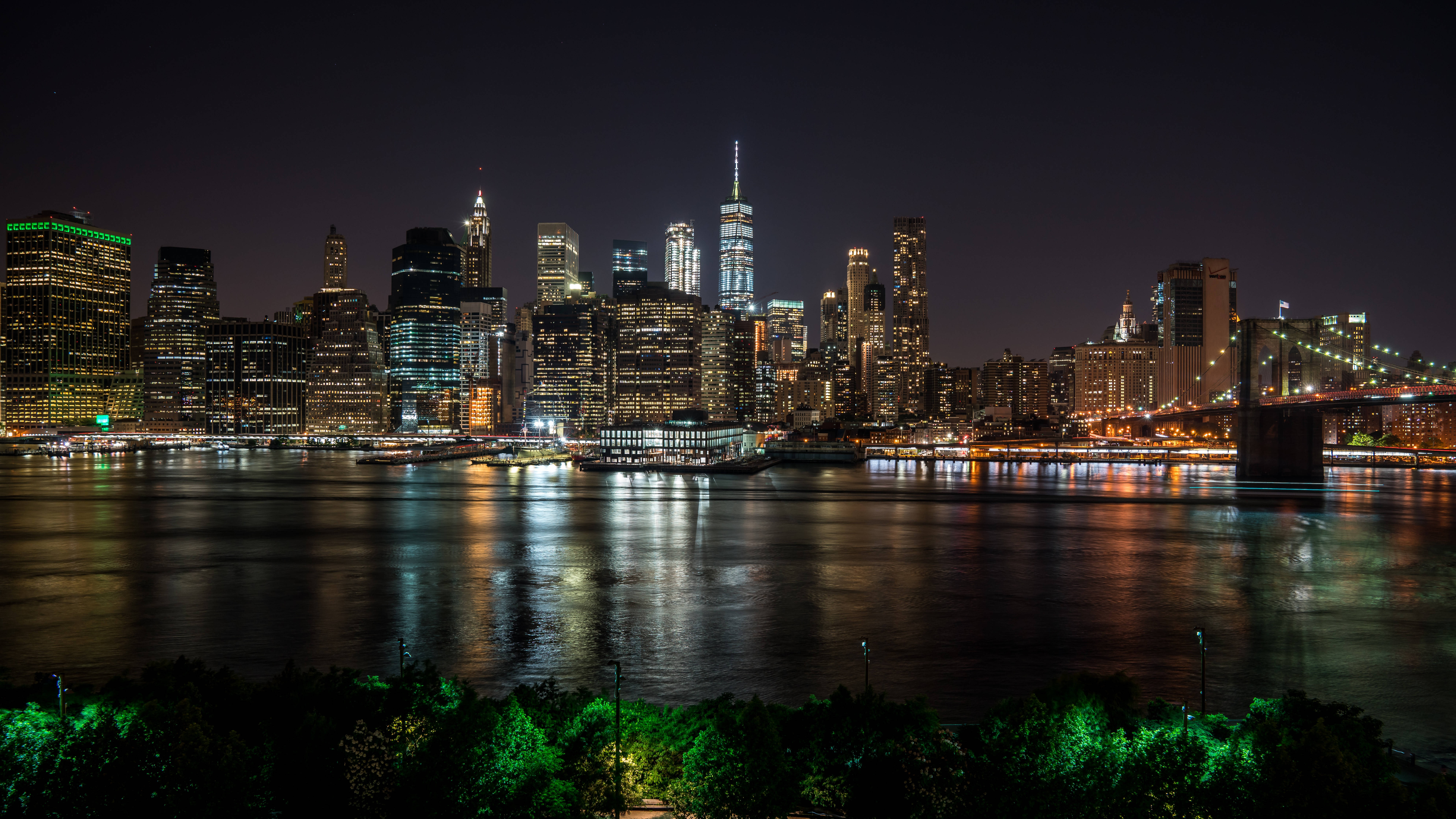 New York City, nighttime cityscape, illuminated skyscrapers, 8K Desktop Wallpaper