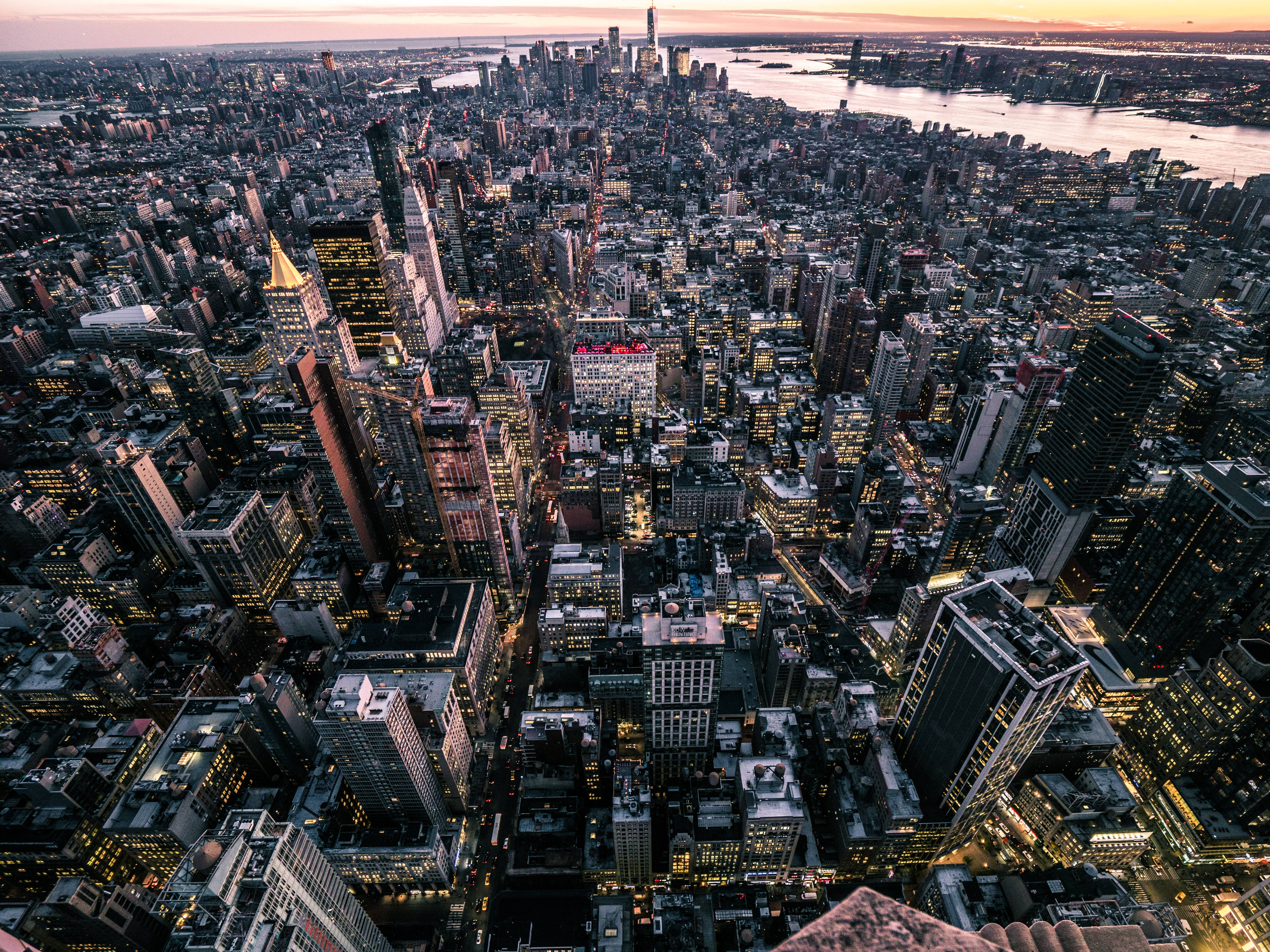 New York Cityscape, dusk, glowing skyscrapers, 5K Desktop Wallpaper