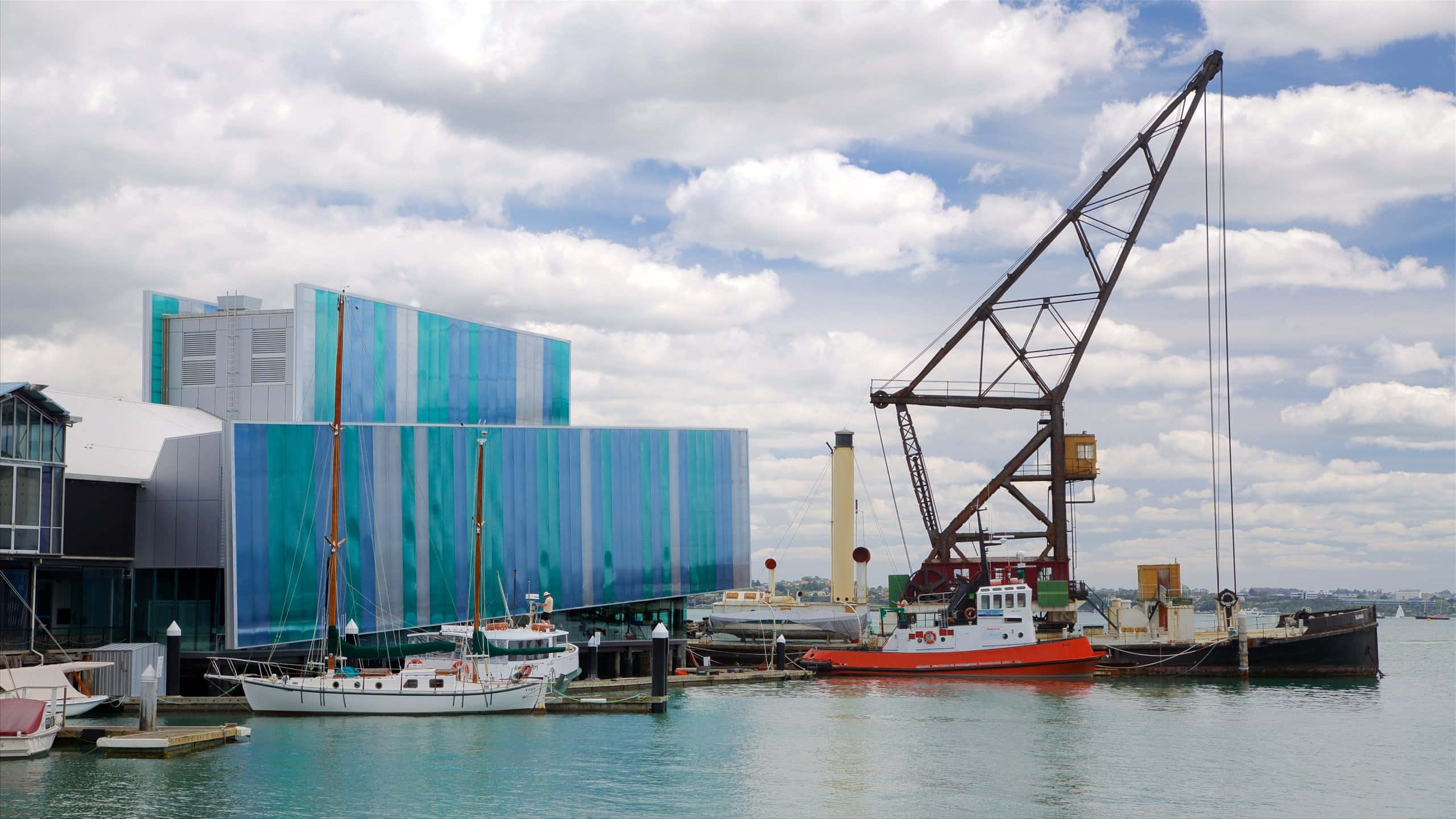 New Zealand Maritime Museum, modern glass building, blue stripes, 2K Desktop Wallpaper