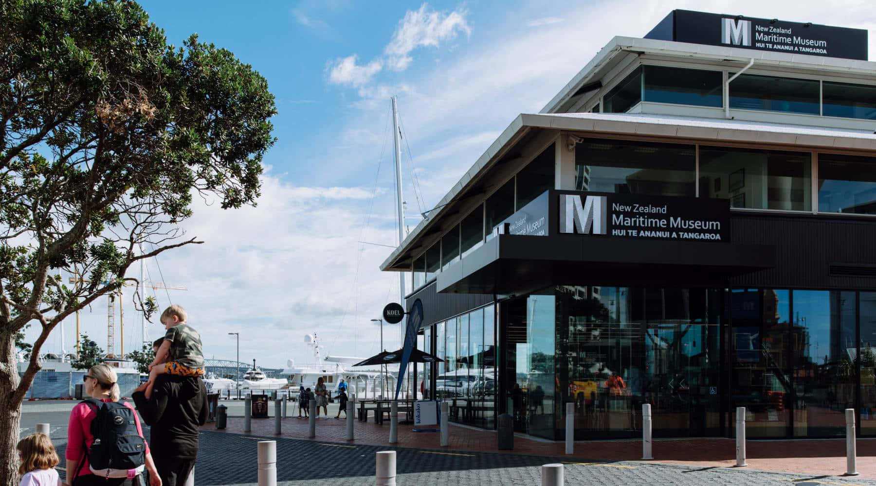 New Zealand Maritime Museum, glass-fronted building, bright blue sky, HD Desktop Wallpaper