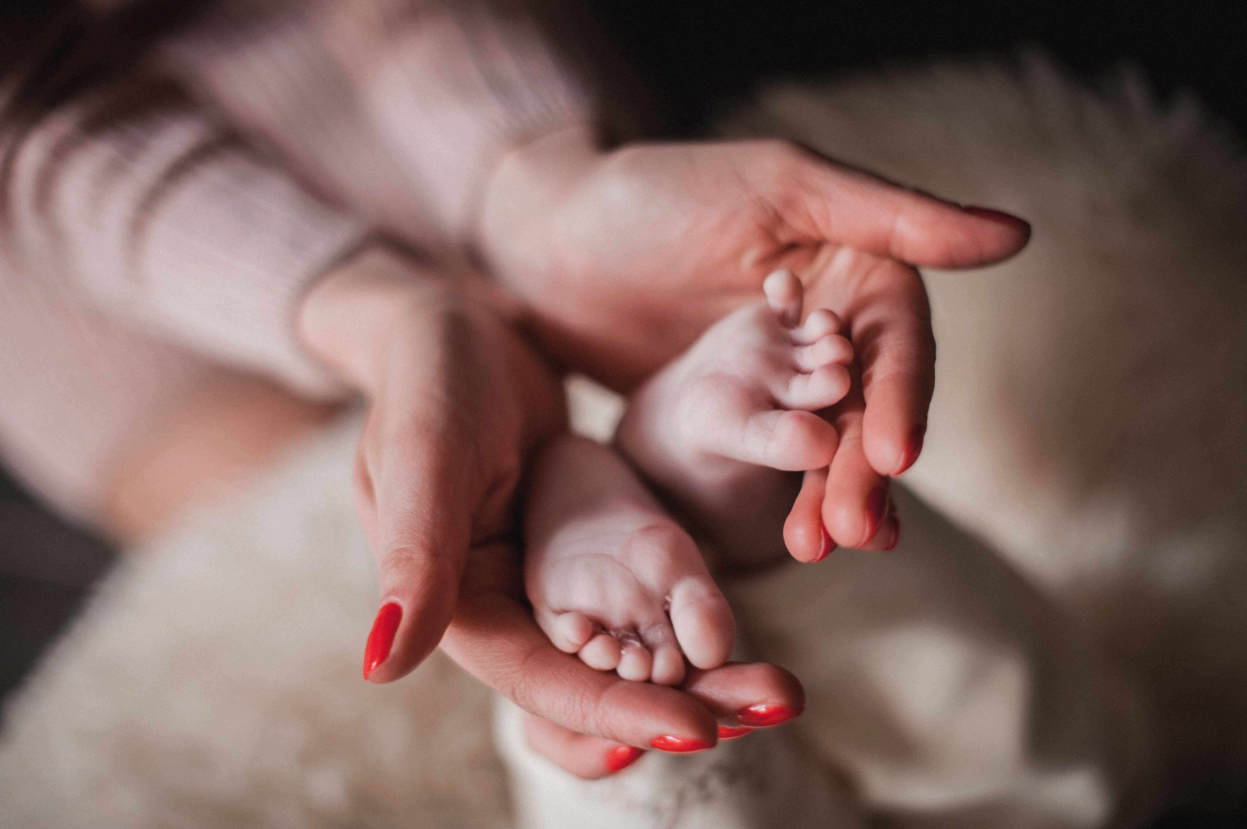 newborn baby girl, red nails, adult hands, 4K Desktop Wallpaper