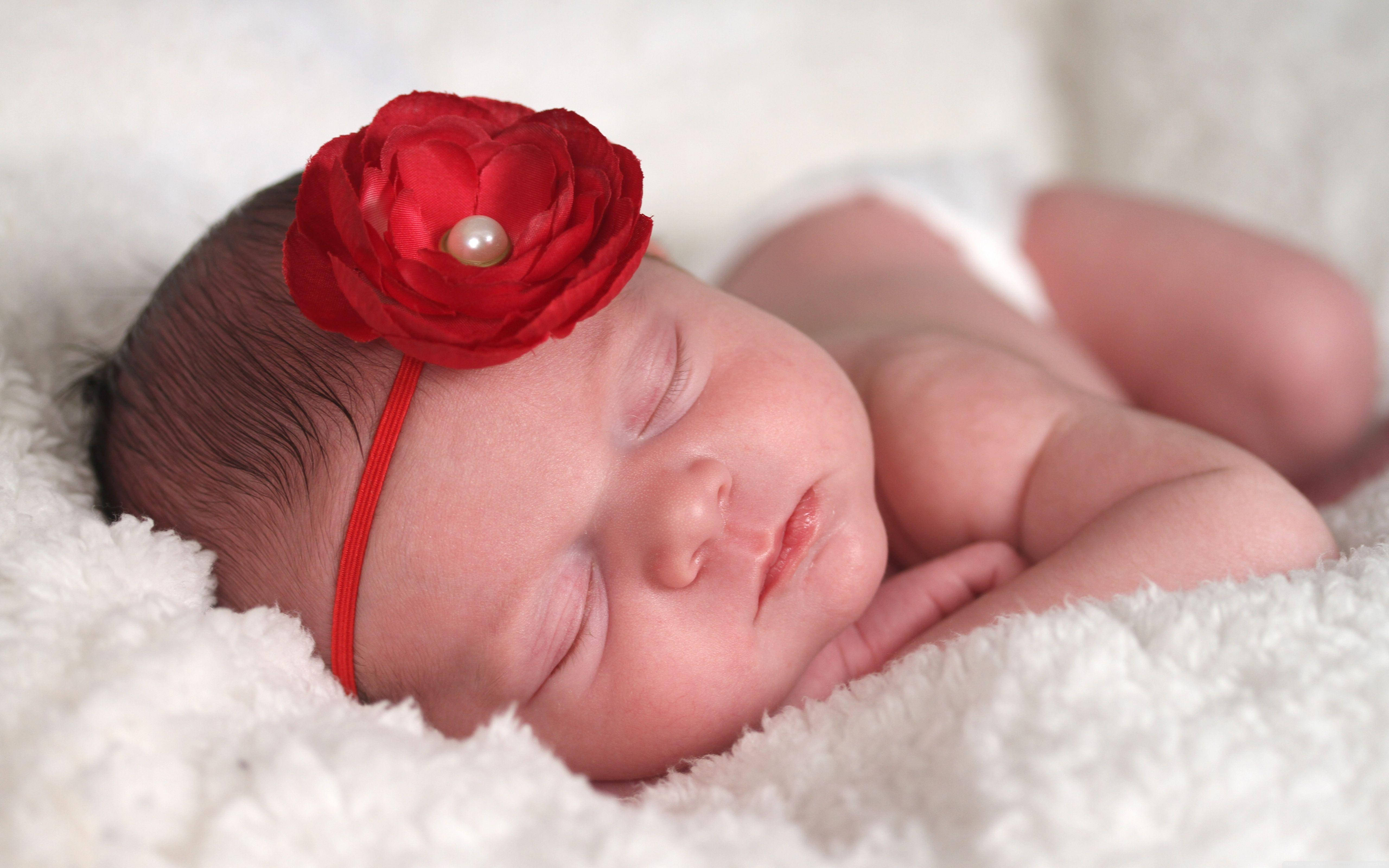 newborn baby, fluffy white blanket, vibrant red floral headband, 5K Desktop Wallpaper