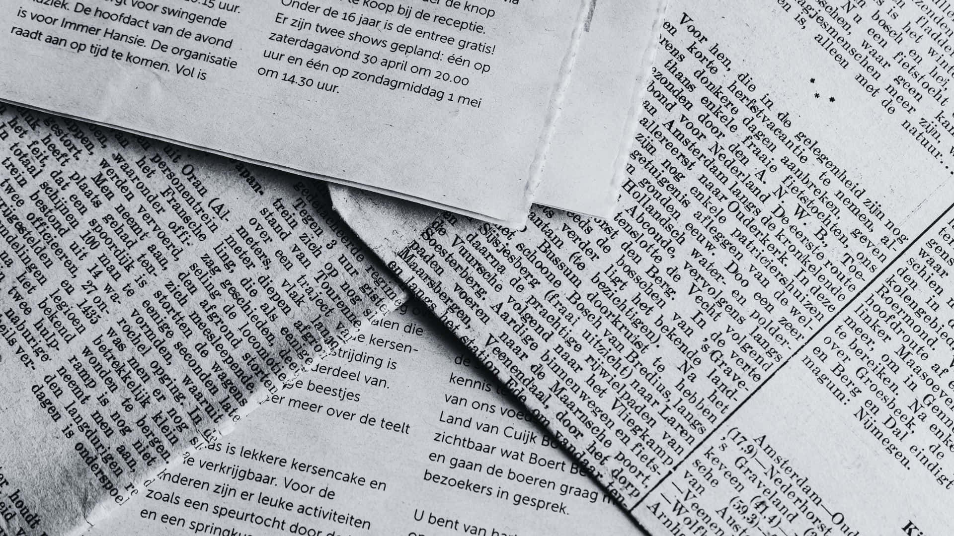 black and white newspaper, wooden table, Dutch text, Full HD Desktop Wallpaper