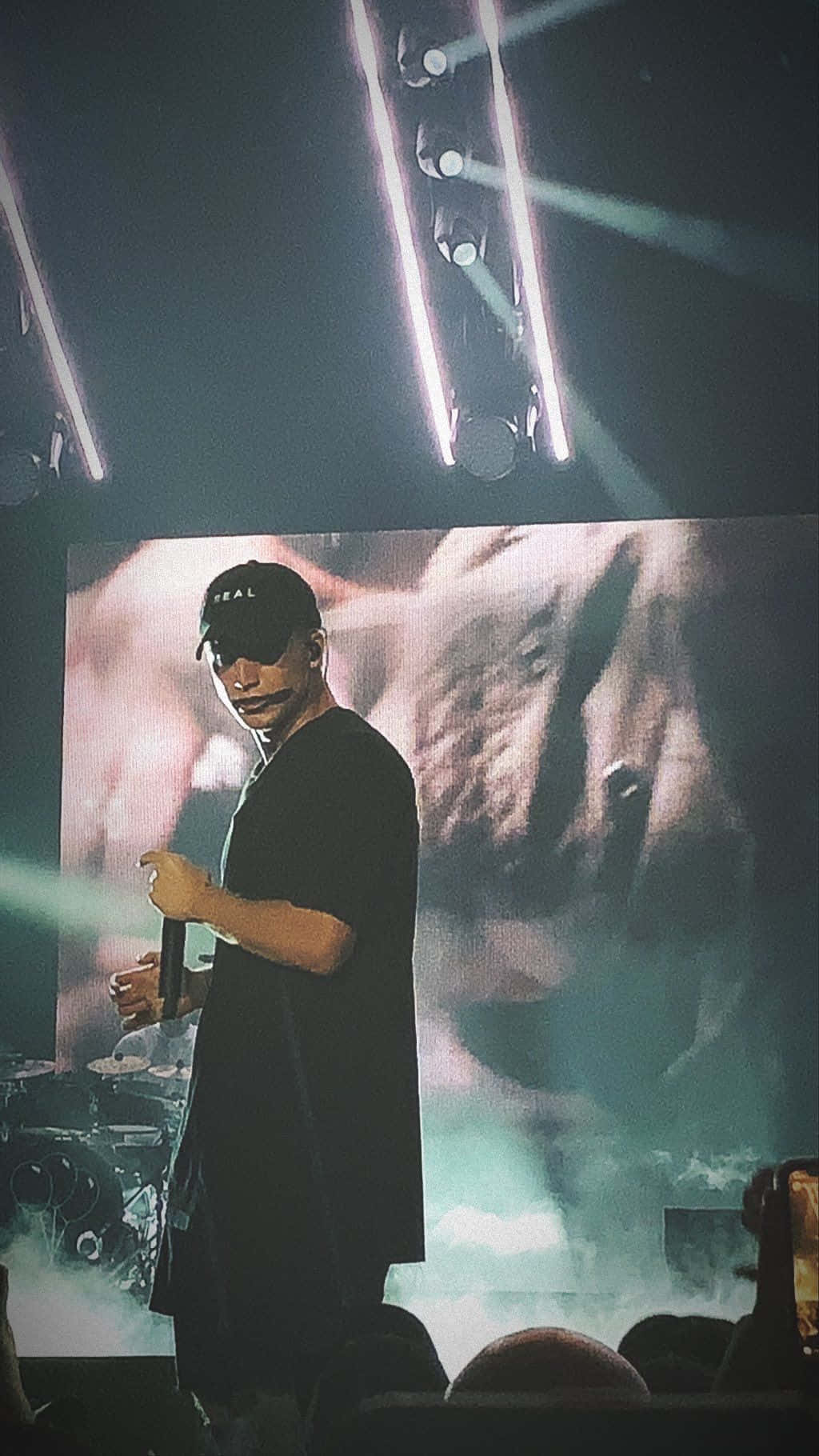 NF, black cap, dimly lit stage, HD Phone Wallpaper