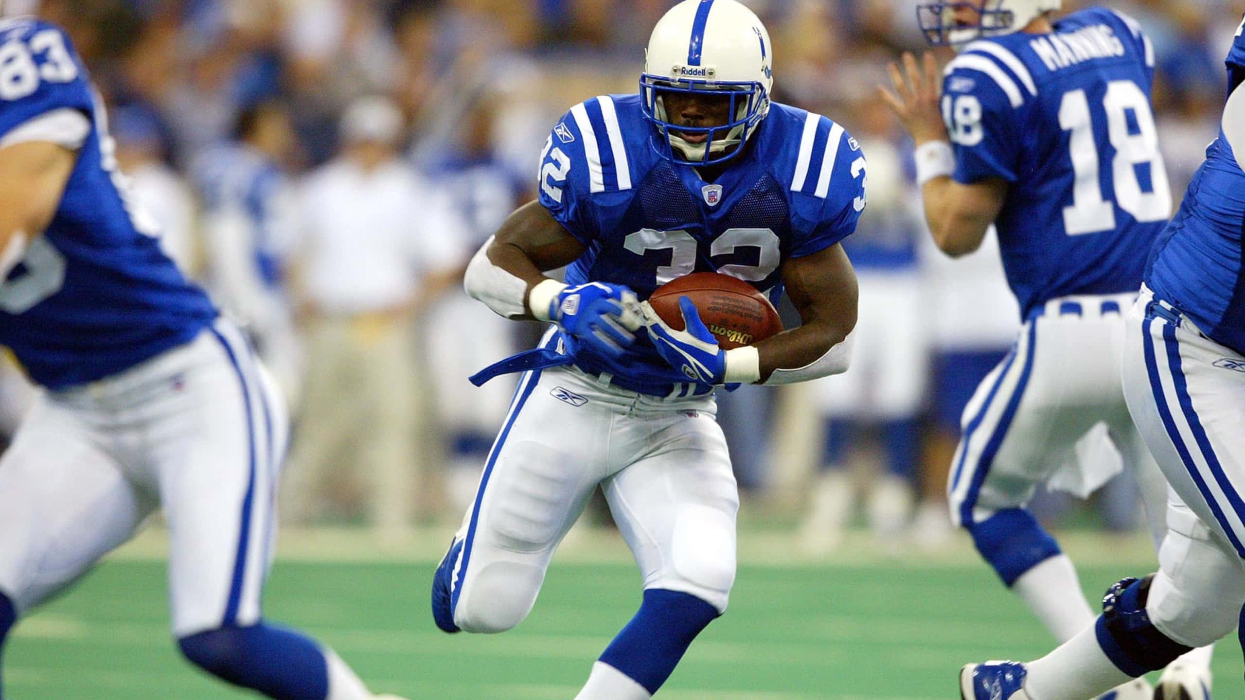 NFL Running Back, blue and white uniform, sprints with the ball, 2K Desktop Wallpaper