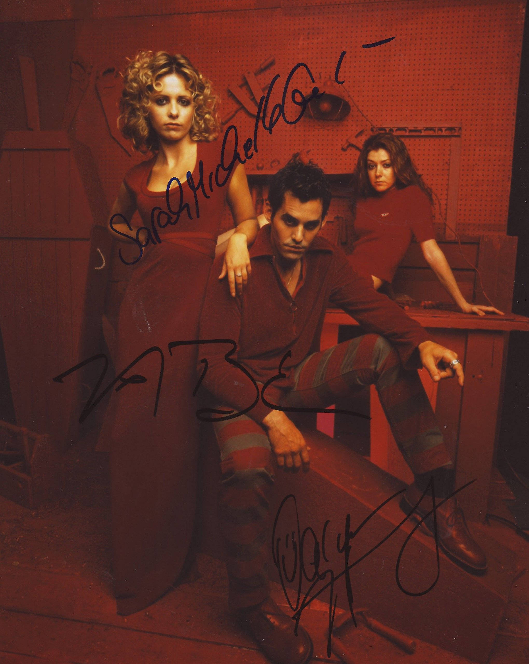 Nicholas Brendon, red attire, dimly lit workshop, 2K Phone Wallpaper