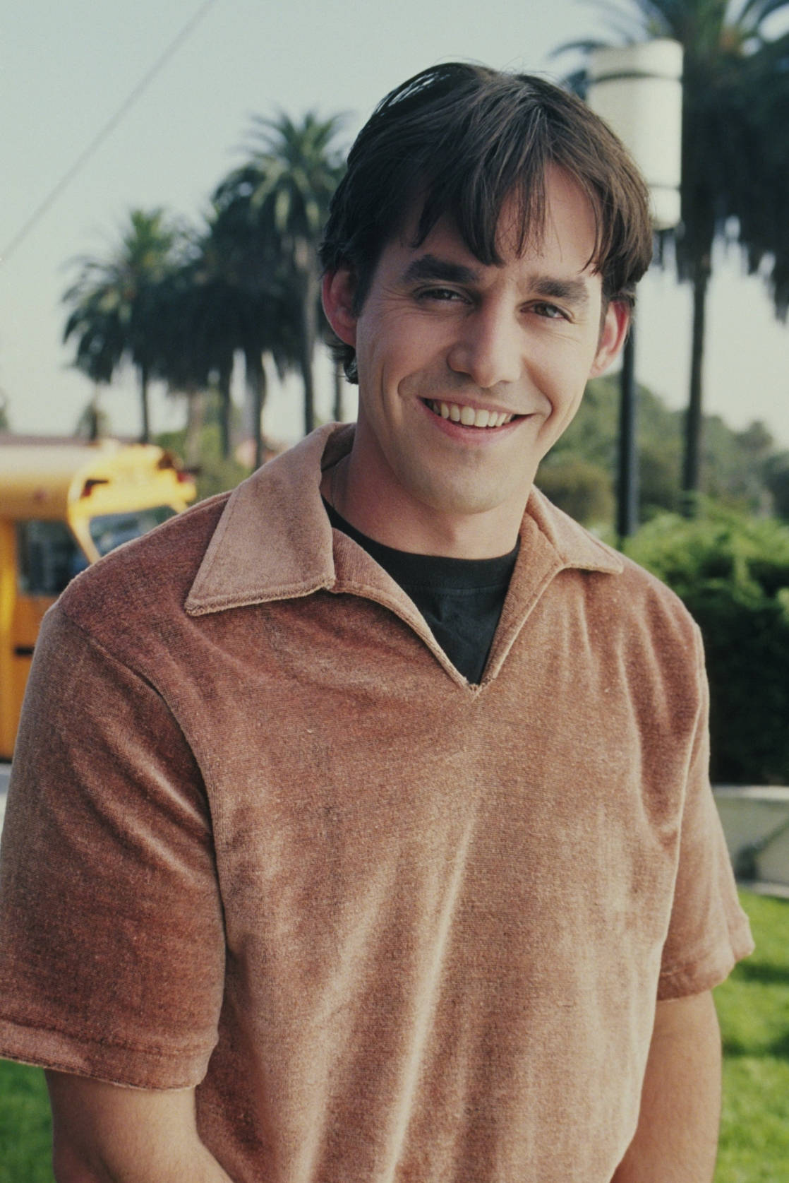 Nicholas Brendon, brown polo shirt, palm trees, HD Phone Wallpaper