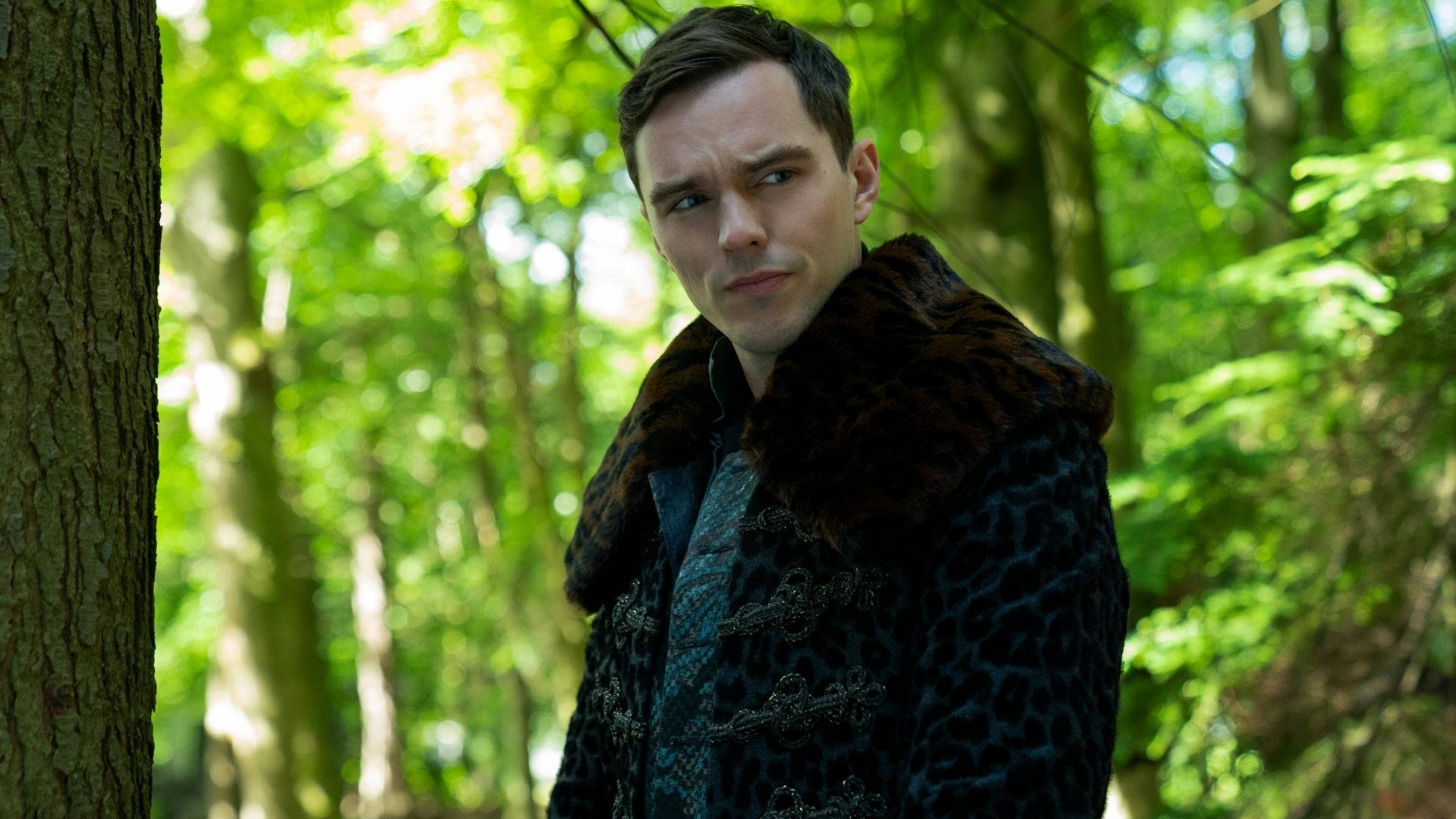 Nicholas Hoult, leopard-print coat, sunlit forest, Full HD Desktop Wallpaper