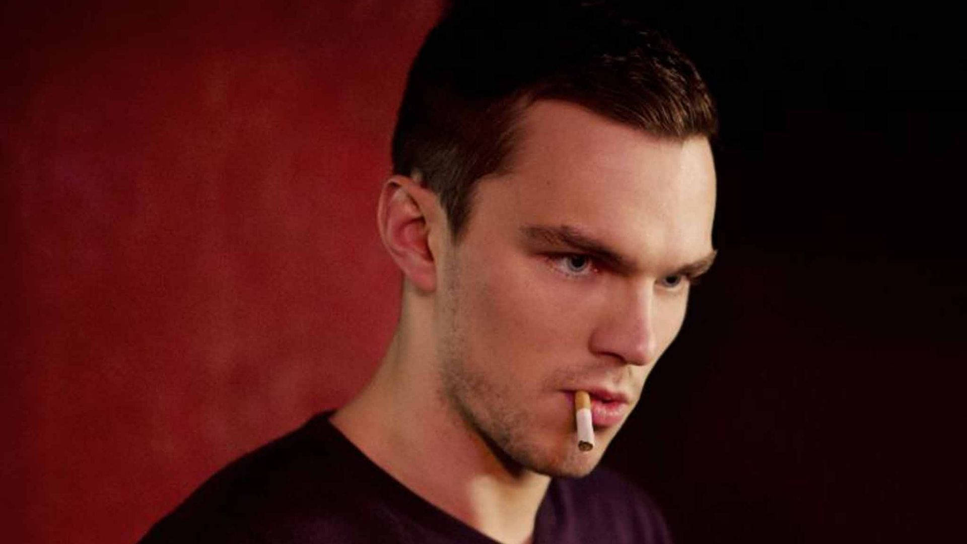 Nicholas Hoult, cigarette, deep red textured wall, Full HD Desktop Wallpaper