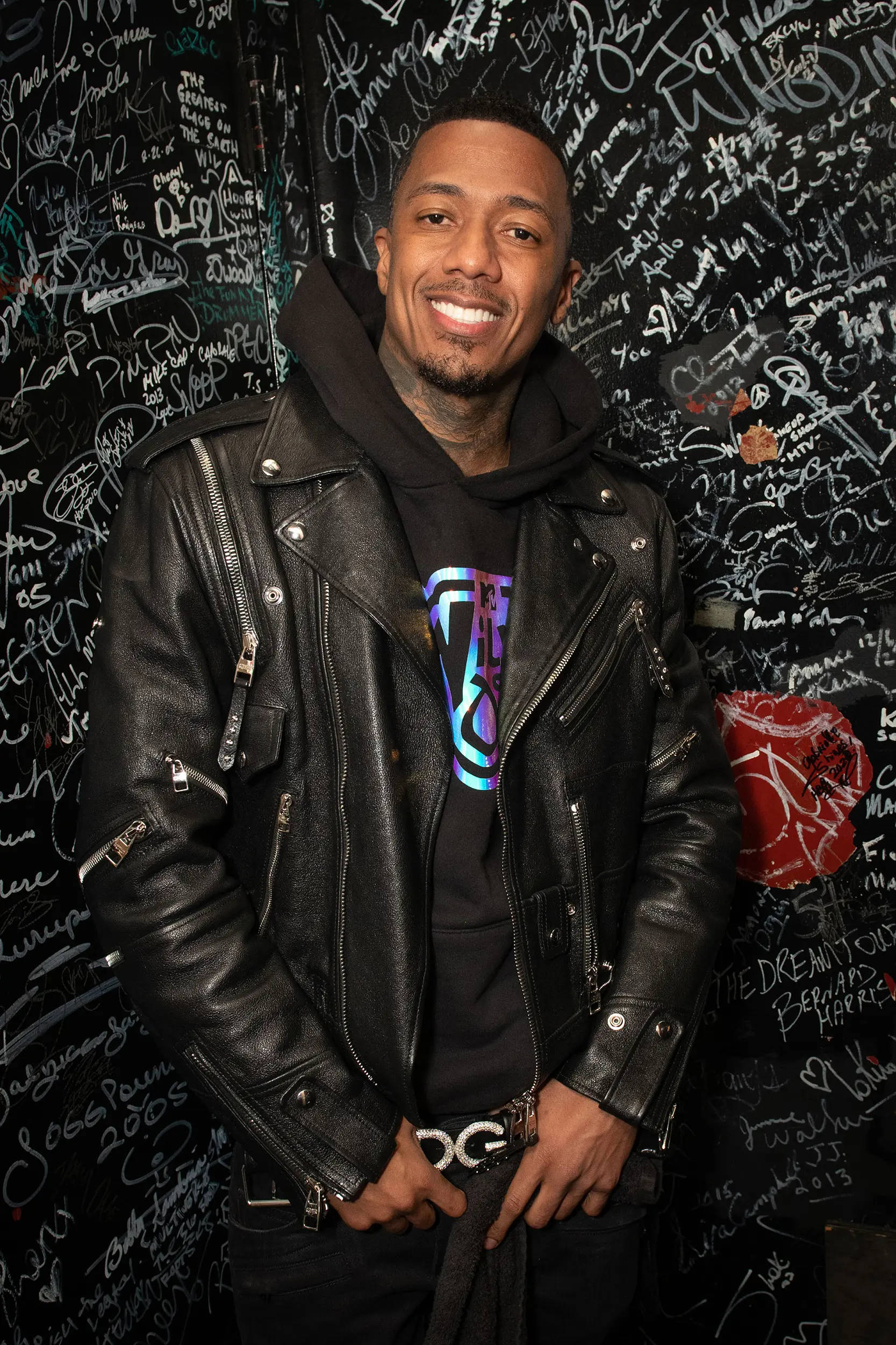 Nick Cannon, black leather jacket, graffiti-covered wall, Full HD Phone Wallpaper