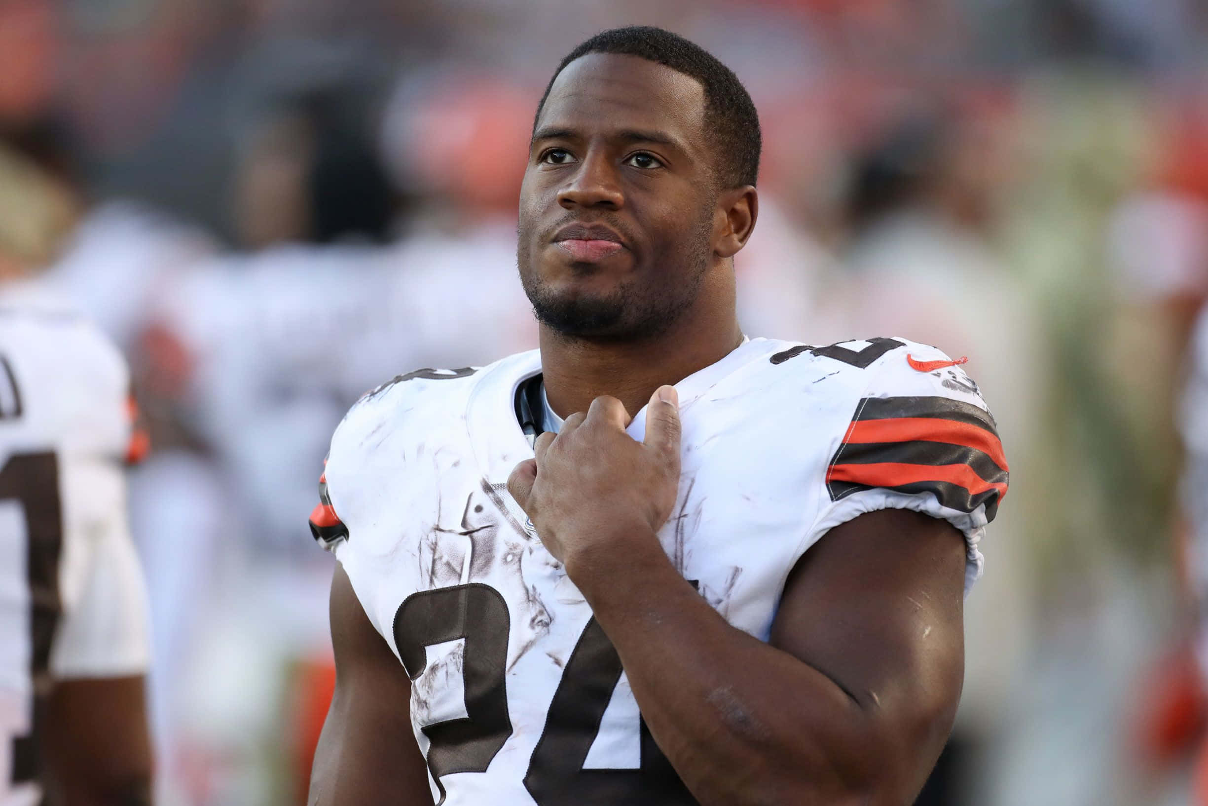 Nick Chubb, white jersey, orange and brown stripes, Full HD Desktop Wallpaper
